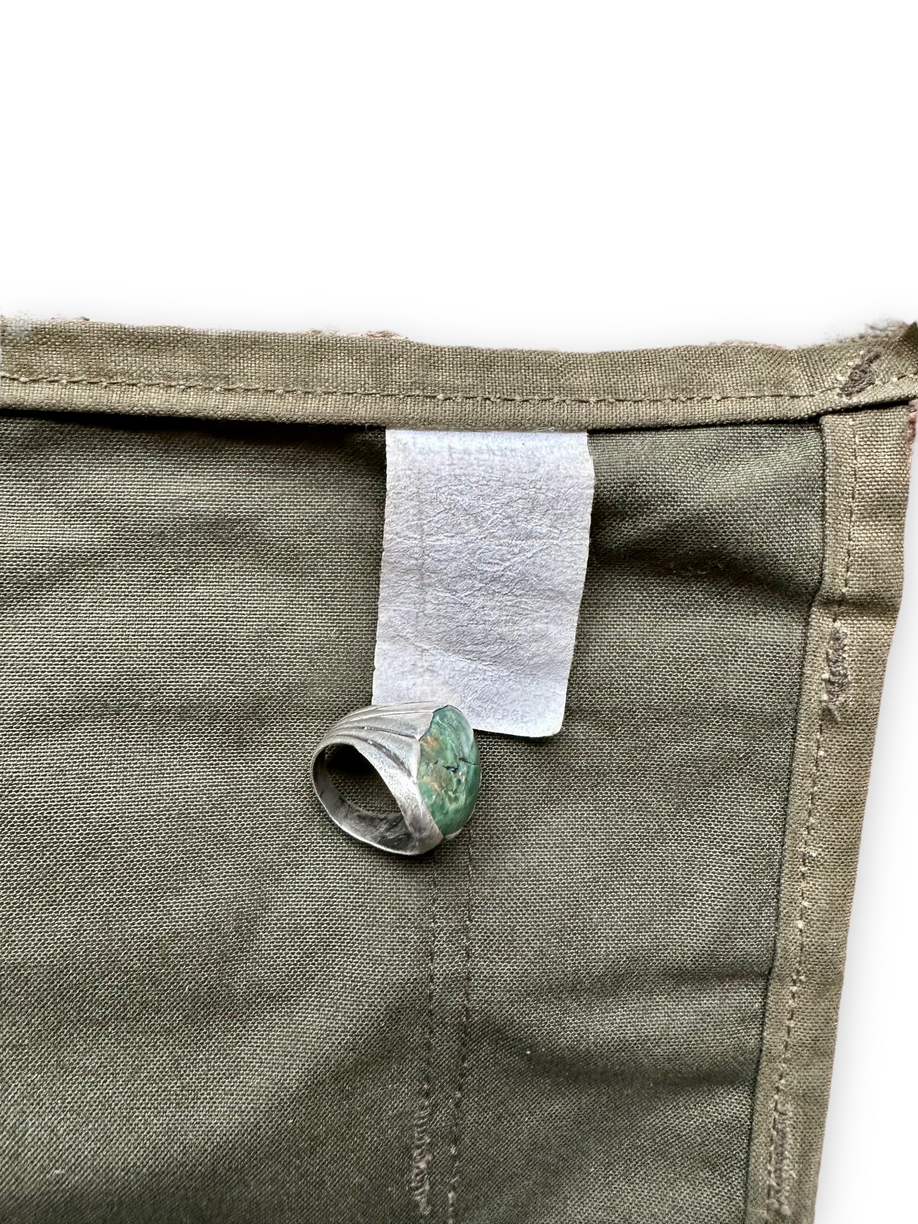 Nigh Illegible Production Tag on Filson Workshop Tool Apron SZ L |  Barn Owl Vintage Goods | Vintage Workwear Seattle