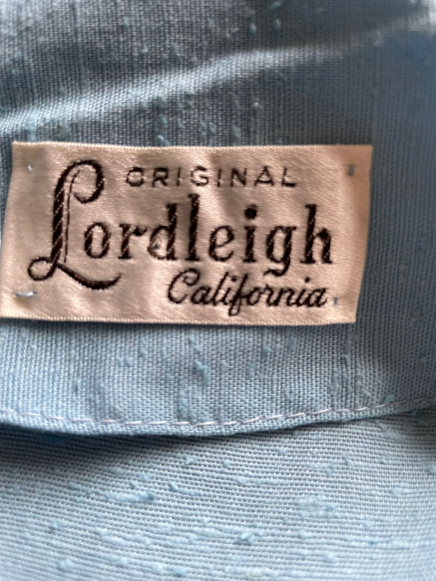 Vintage 1950s Deadstock Lordleigh Light Blue Silk and Rayon Dress SZ M|  Barn Owl Vintage | Seattle Vintage Dresses Dress tag view.