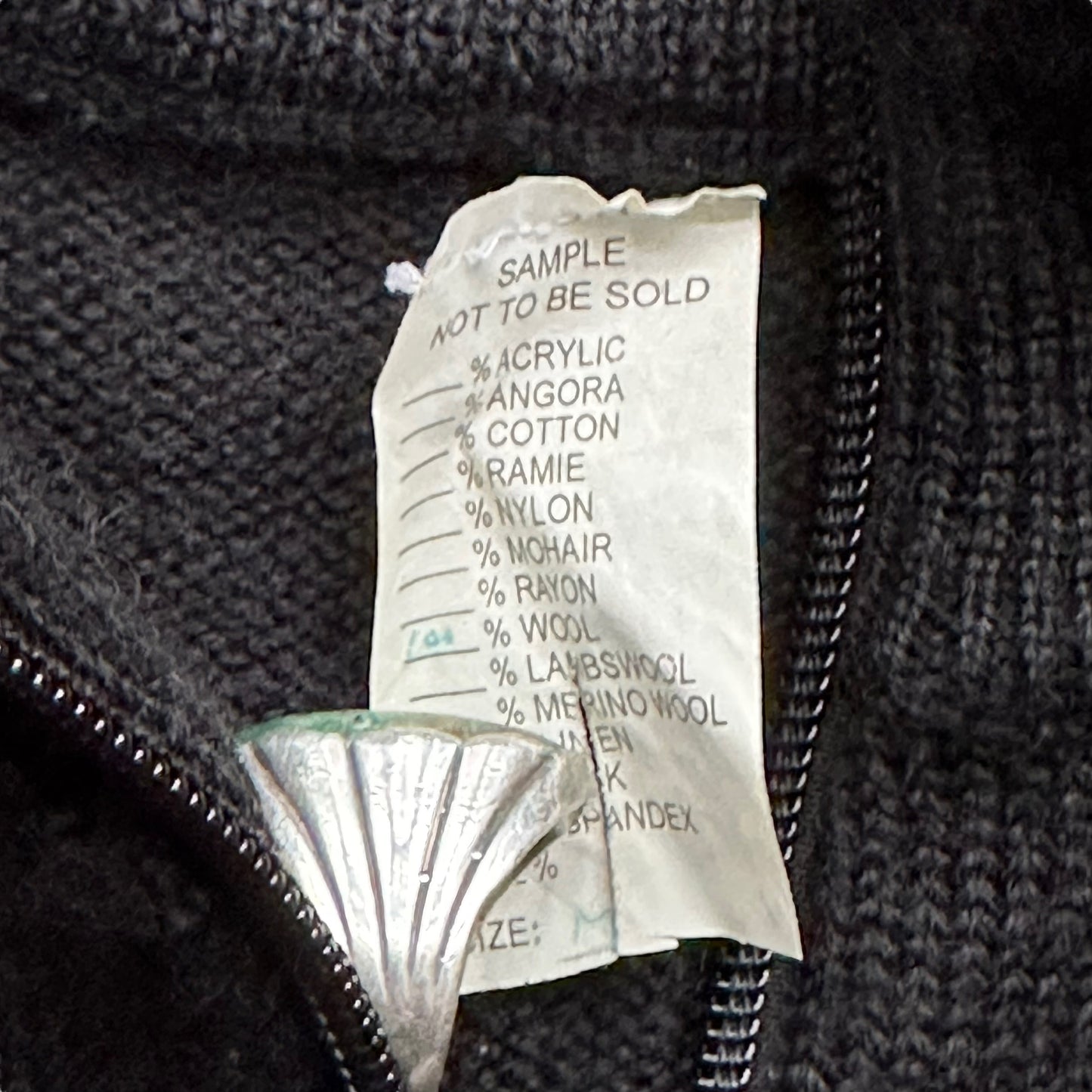 Production Tag on Black Filson Zip Up Wool Sweater Vest SZ M | Filson Production Sample Seattle | Barn Owl Vintage