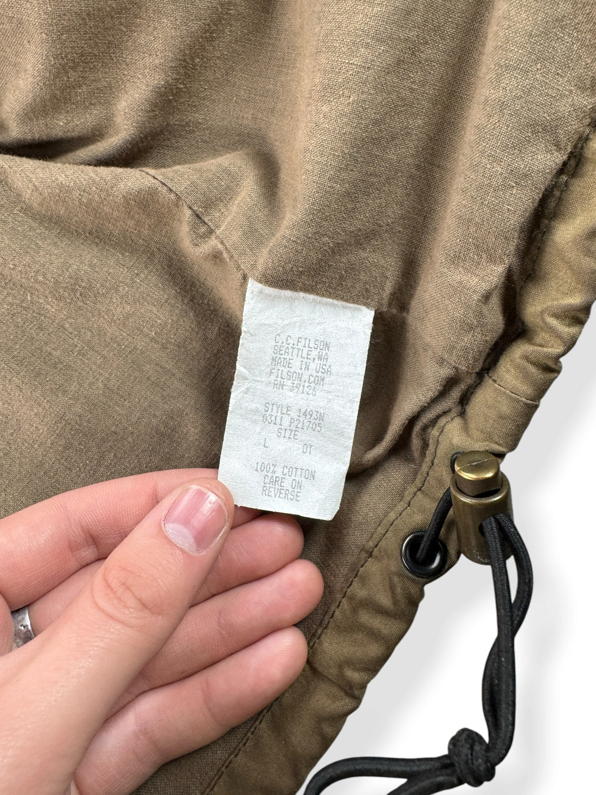 Info tag on Filson 2000s Era Tin Cloth 1493N Jacket SZ L