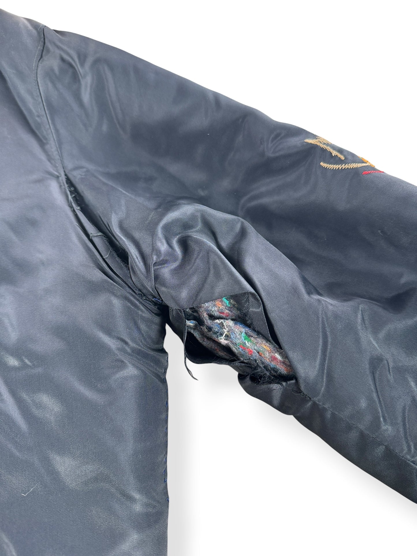 Damage on inner arm seam of Vintage '78 Korea 'Troy' Souvenir Jacket SZ L - AS IS
