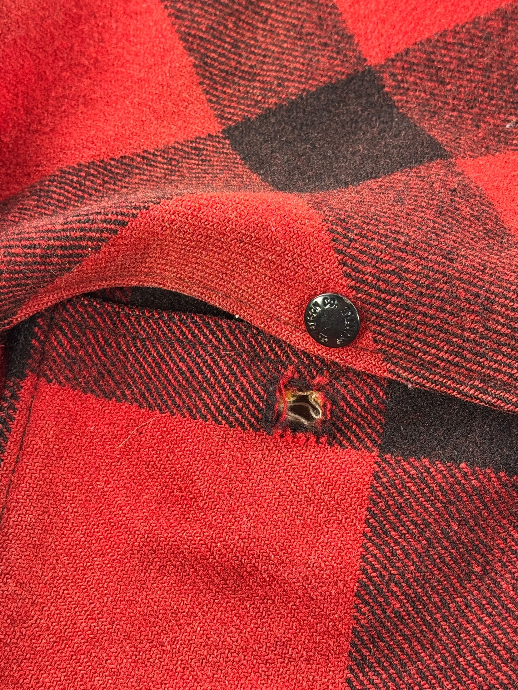 Damaged pocket button on Vintage 80’s Filson Double Mackinaw SZ 44