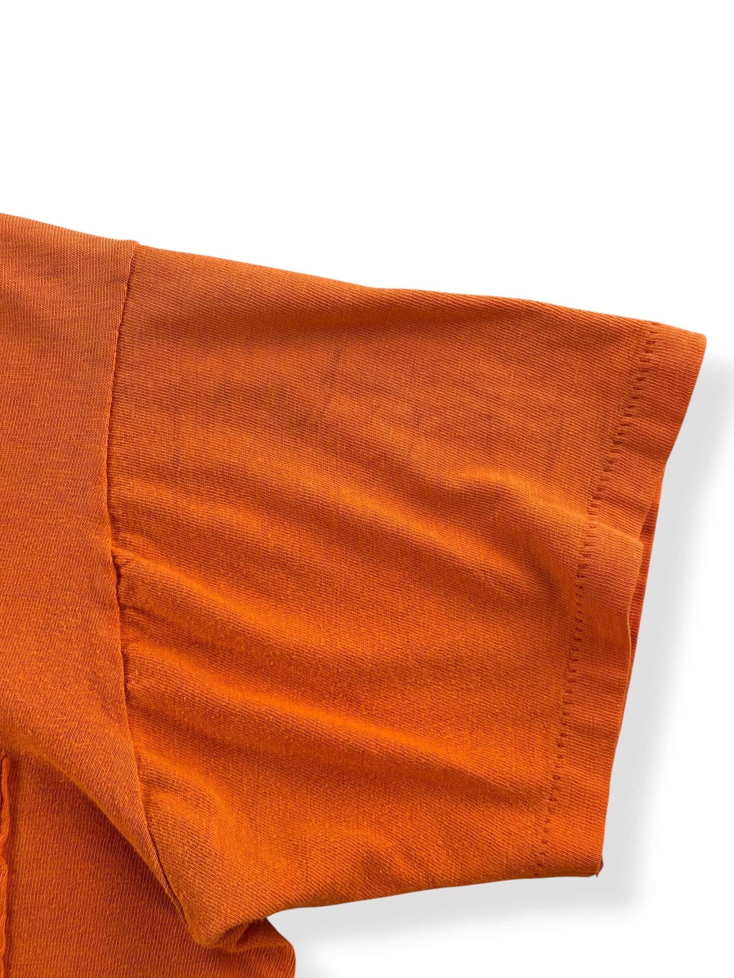 Faint markings on left sleeve of Vintage 1960s Orange Cotton Pocket Tee SZ M