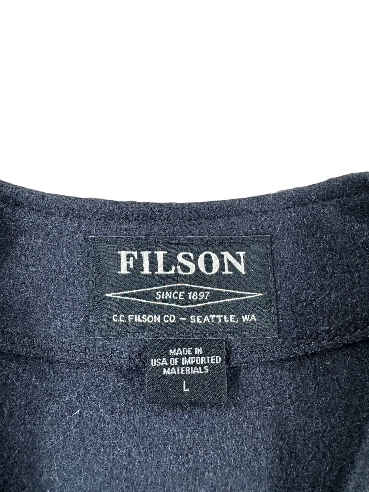 Tag on Filson Navy Wool Vest SZ L