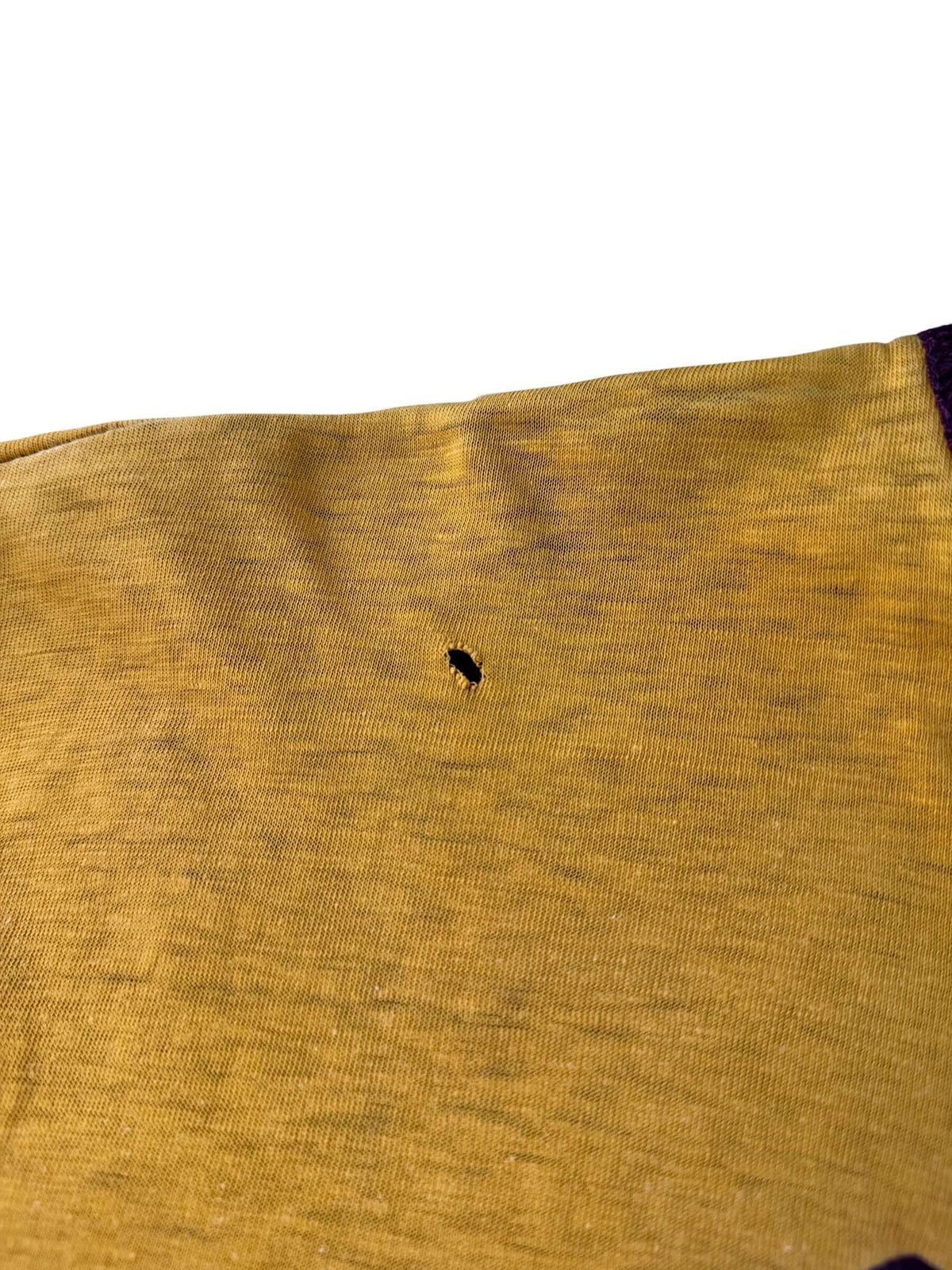 Hole on shoulder of reverse side of Vintage Champion Blue Bar CMA Reversible Tee SZ L
