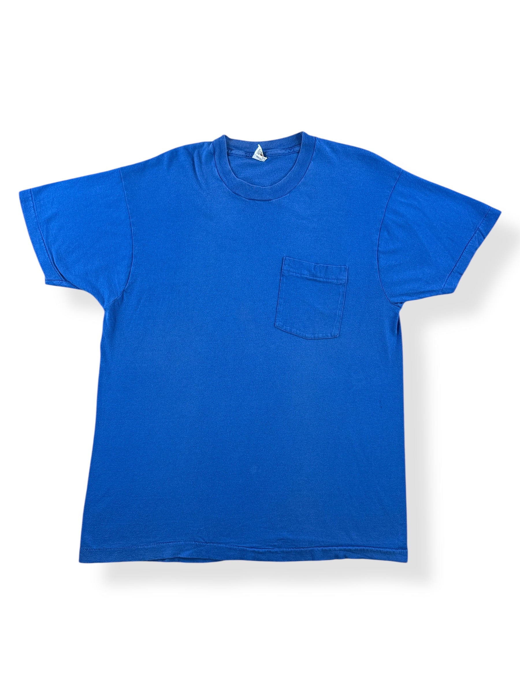 Front of Vintage Fruit of the Loom Blue Pocket Tee SZ XL (Fits L)