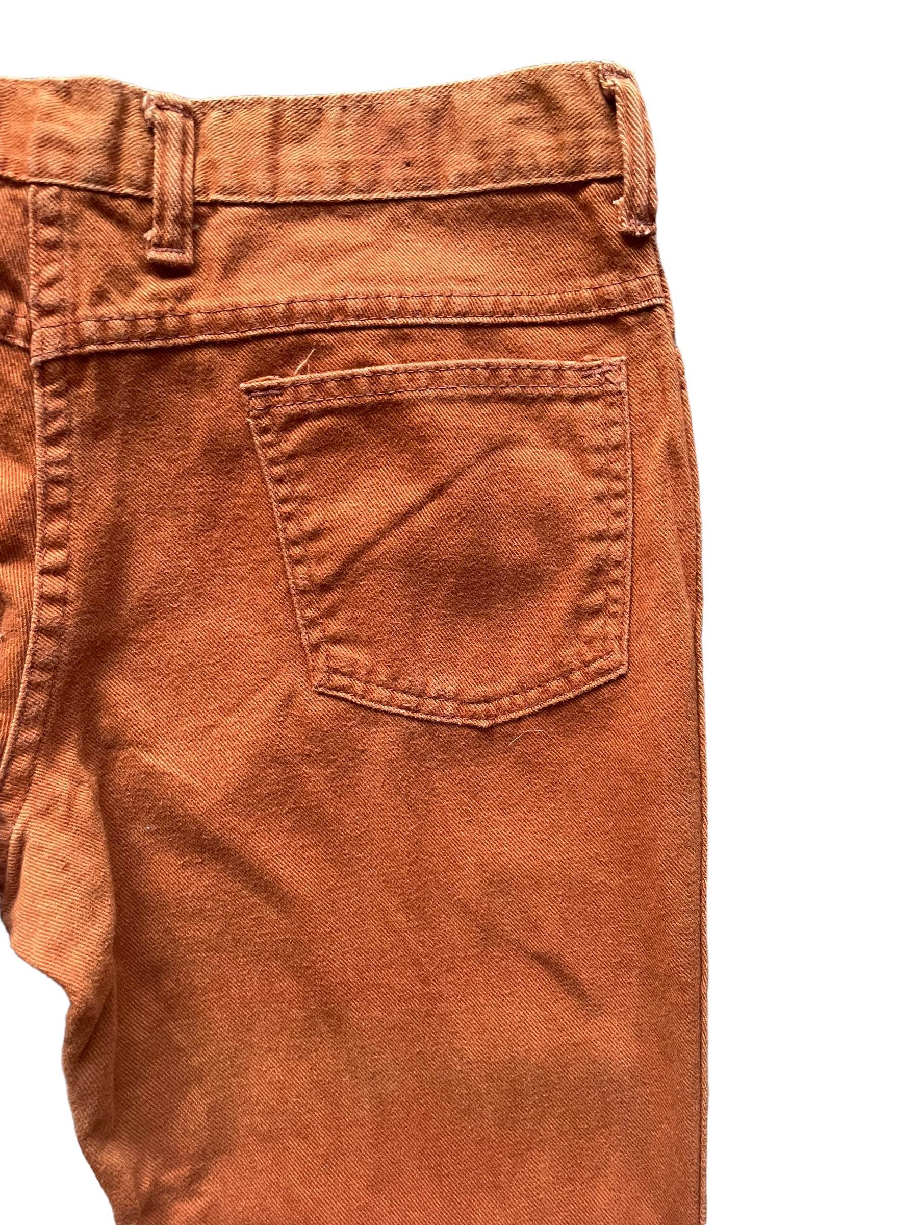 Back right pocket view of Vintage 1970s Rusty Orange Bells W30 | Barn Owl Vintage Seattle | Vintage Pants and Denim