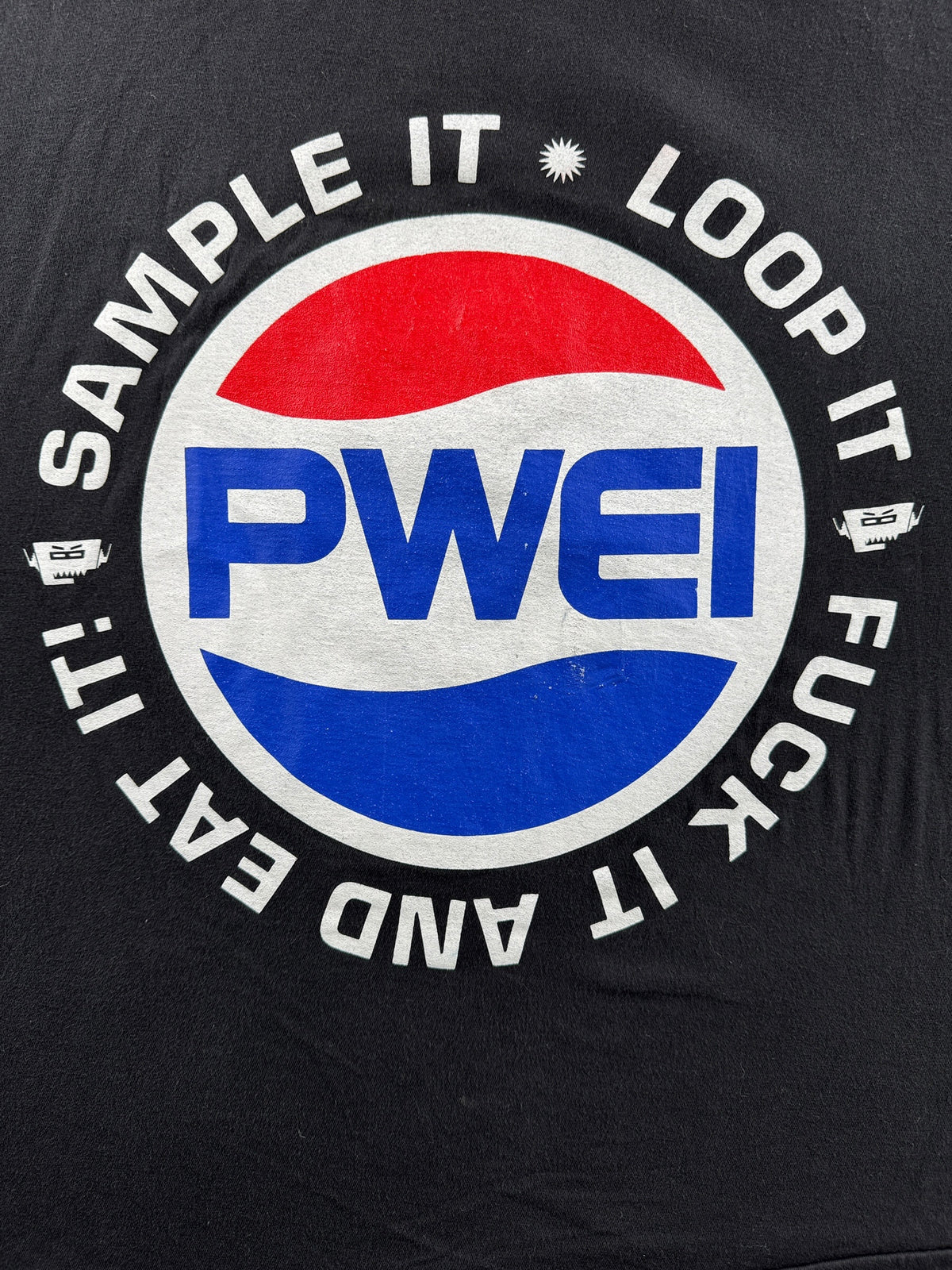 Front graphic on Vintage PWEI Band Tee SZ XL