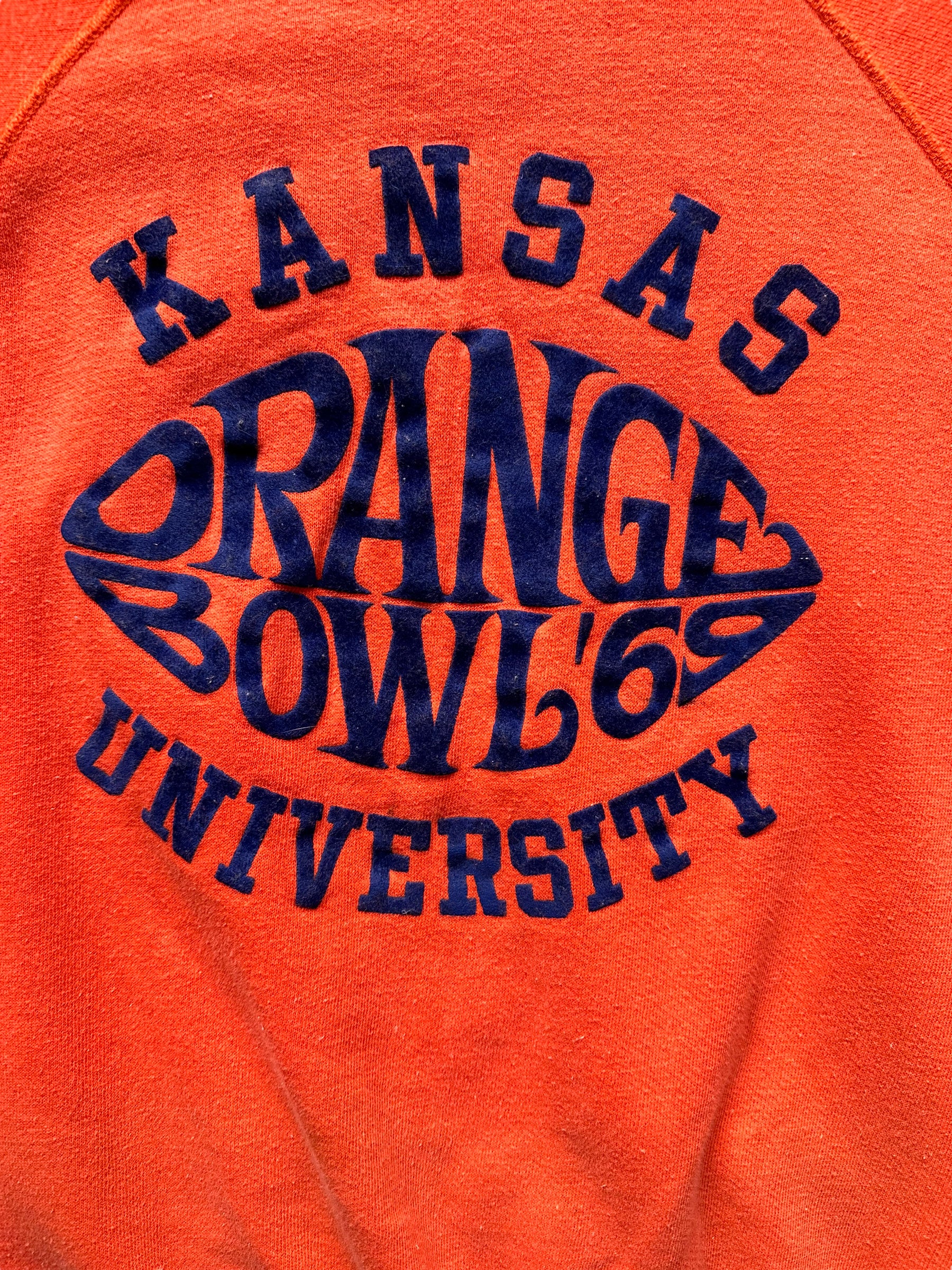 Close up of Flocked Letters on Vintage Artex Kansas University 1969 Orange Bowl Short Sleeve Crewneck Sweatshirt SZ L | Barn Owl Vintage Clothing | Seattle Vintage Sweatshirts