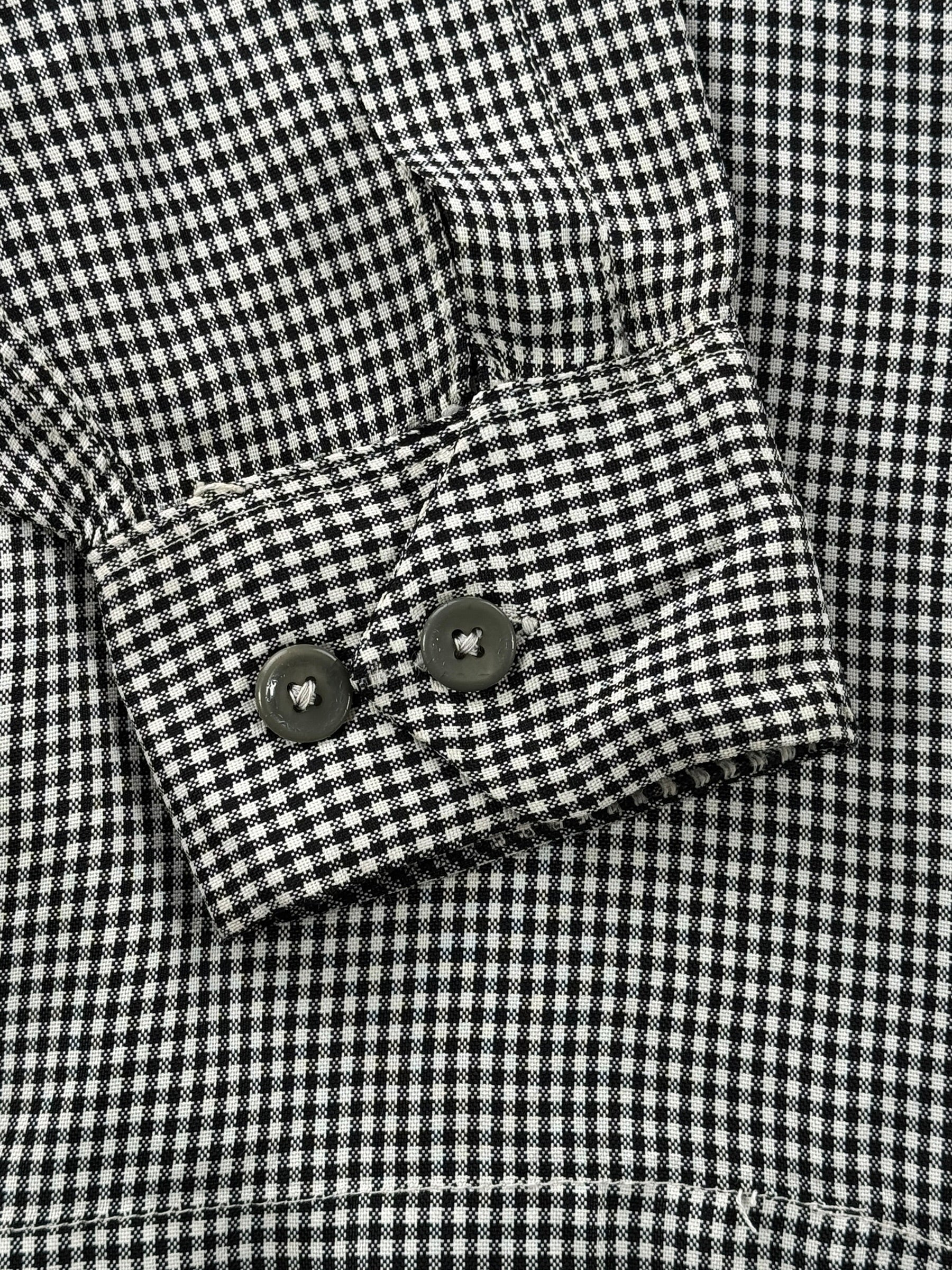 Cuff buttons on Vintage 1950s Sterling Black and White Rayon Loop Collar Shirt SZ M