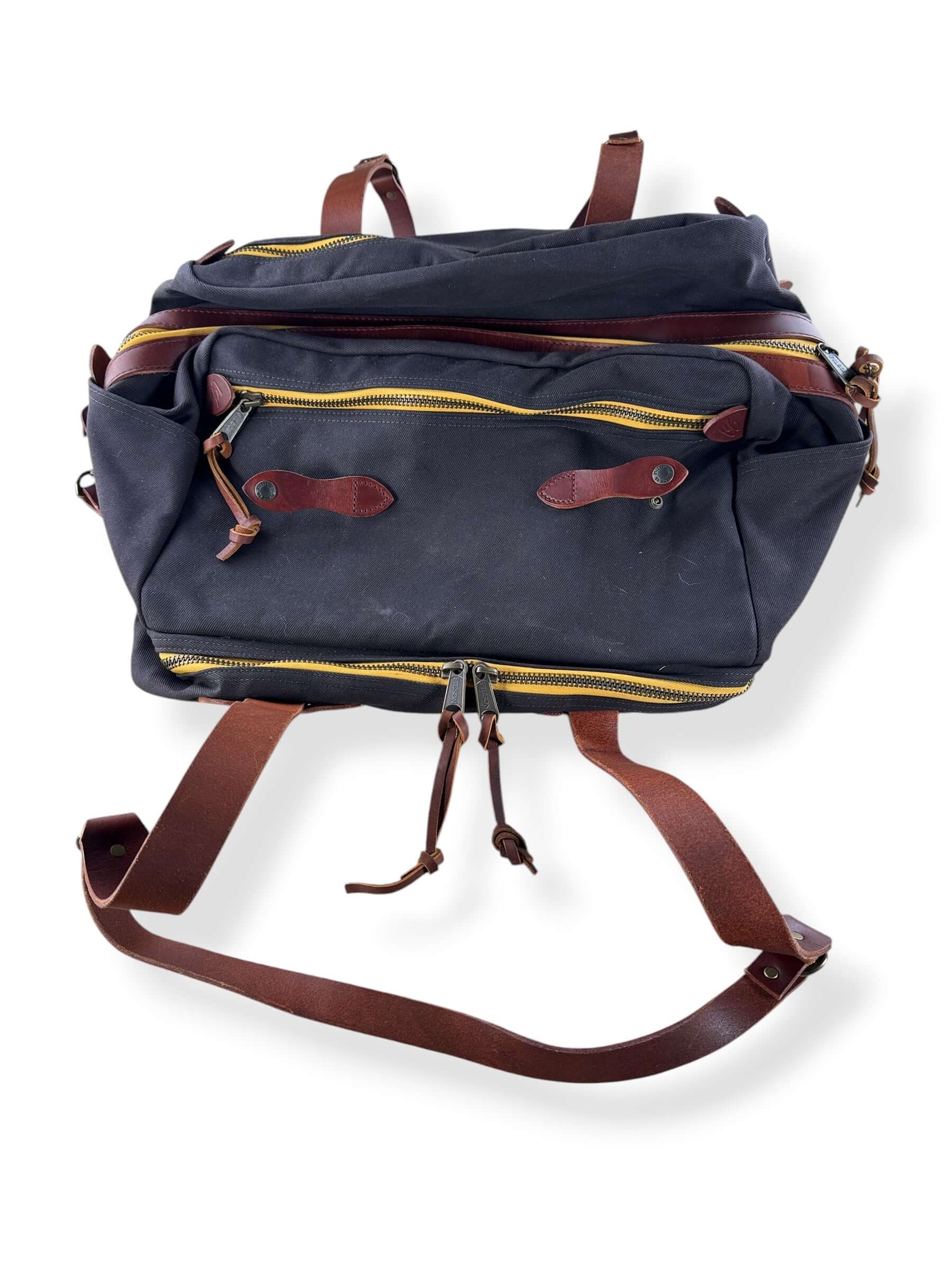 Detatched leather strap on Filson x Chris Stapleton Traveller Outfitter Bag NWOT