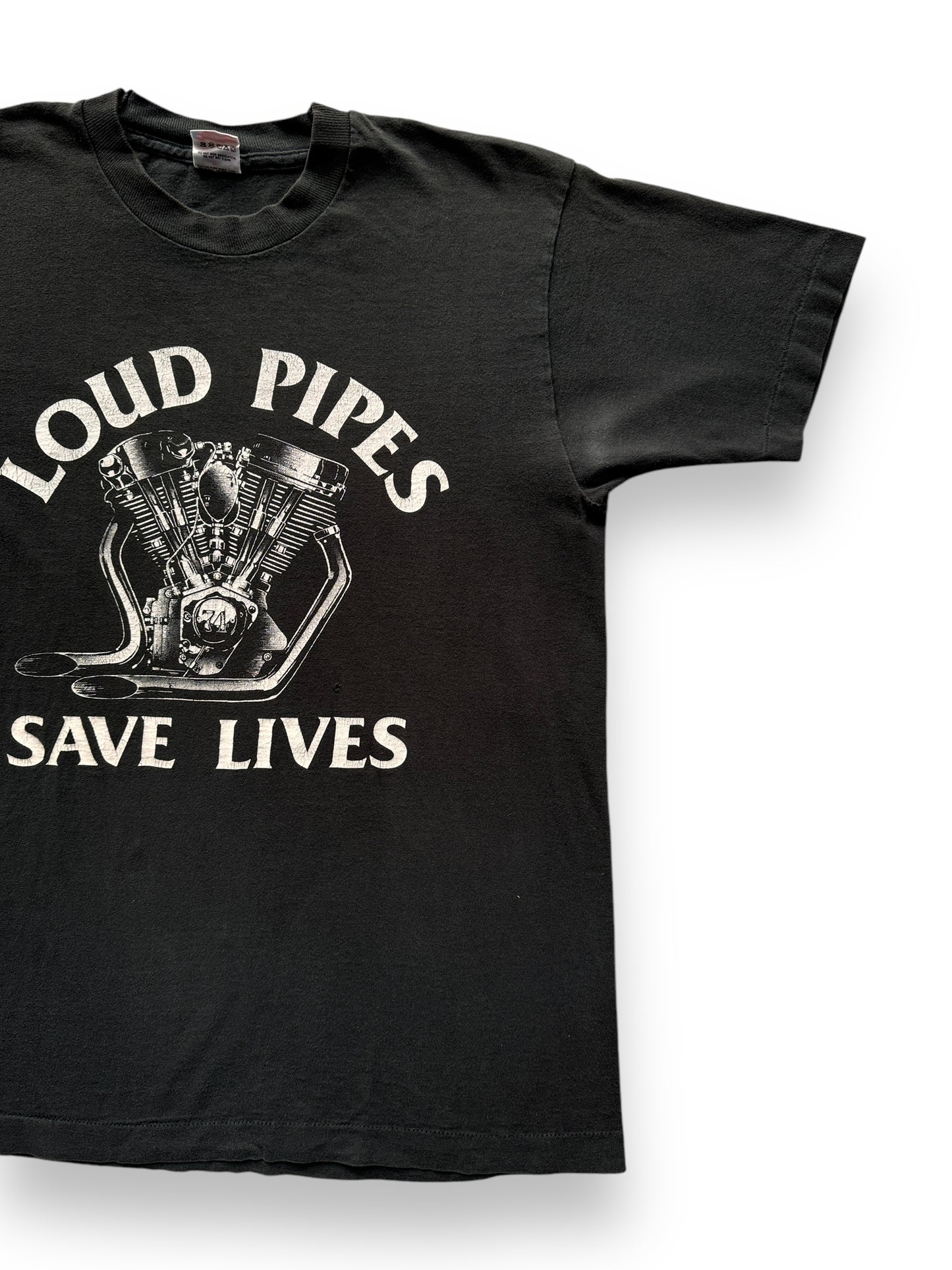 front left of Vintage Loud Pipes Save Lives Tee SZ M