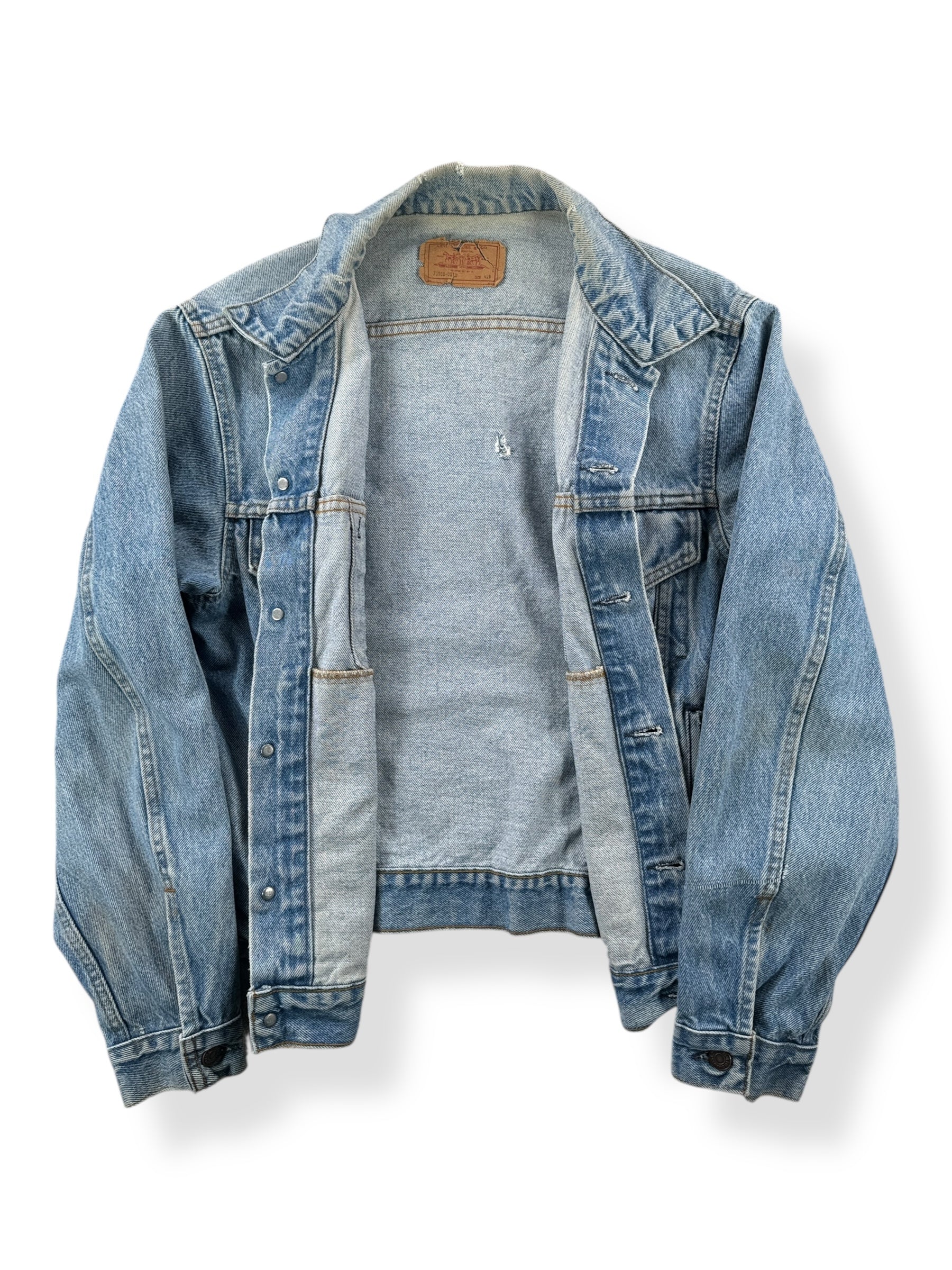 Inside of Vintage 90s MIUSA Levi's Trucker Jacket SZ 42