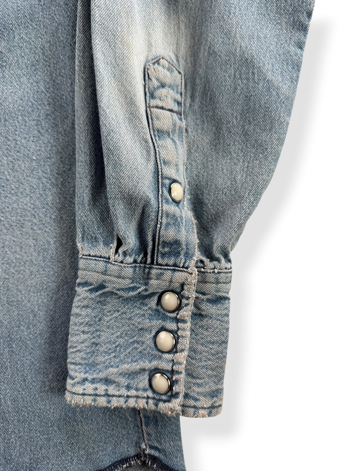 Ware on cuff of Vintage Distressed Wrangler Pearlsnap SZ S