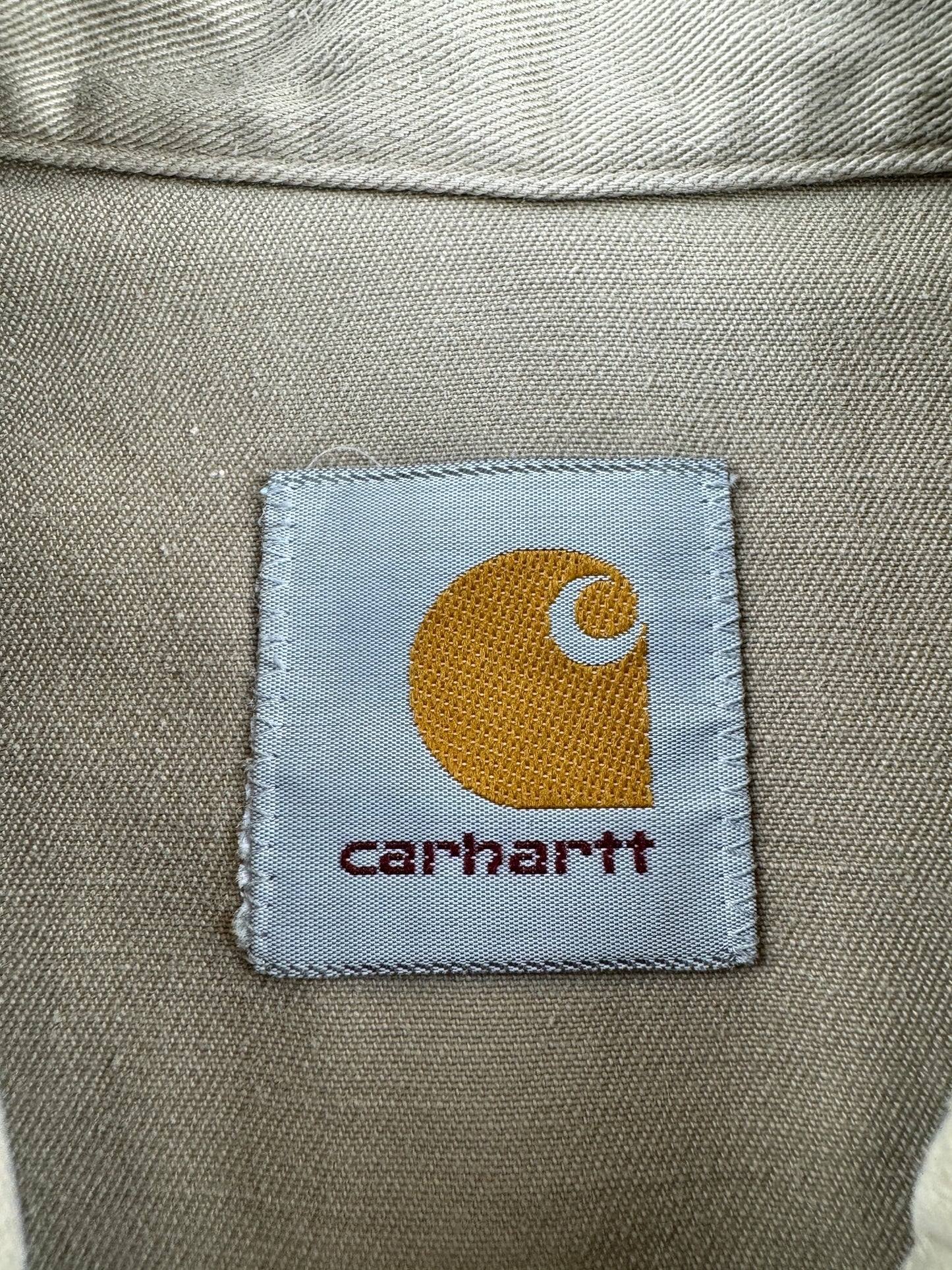 Label on Vintage Tan Carhartt Western Pearl Snap Shirt SZ L