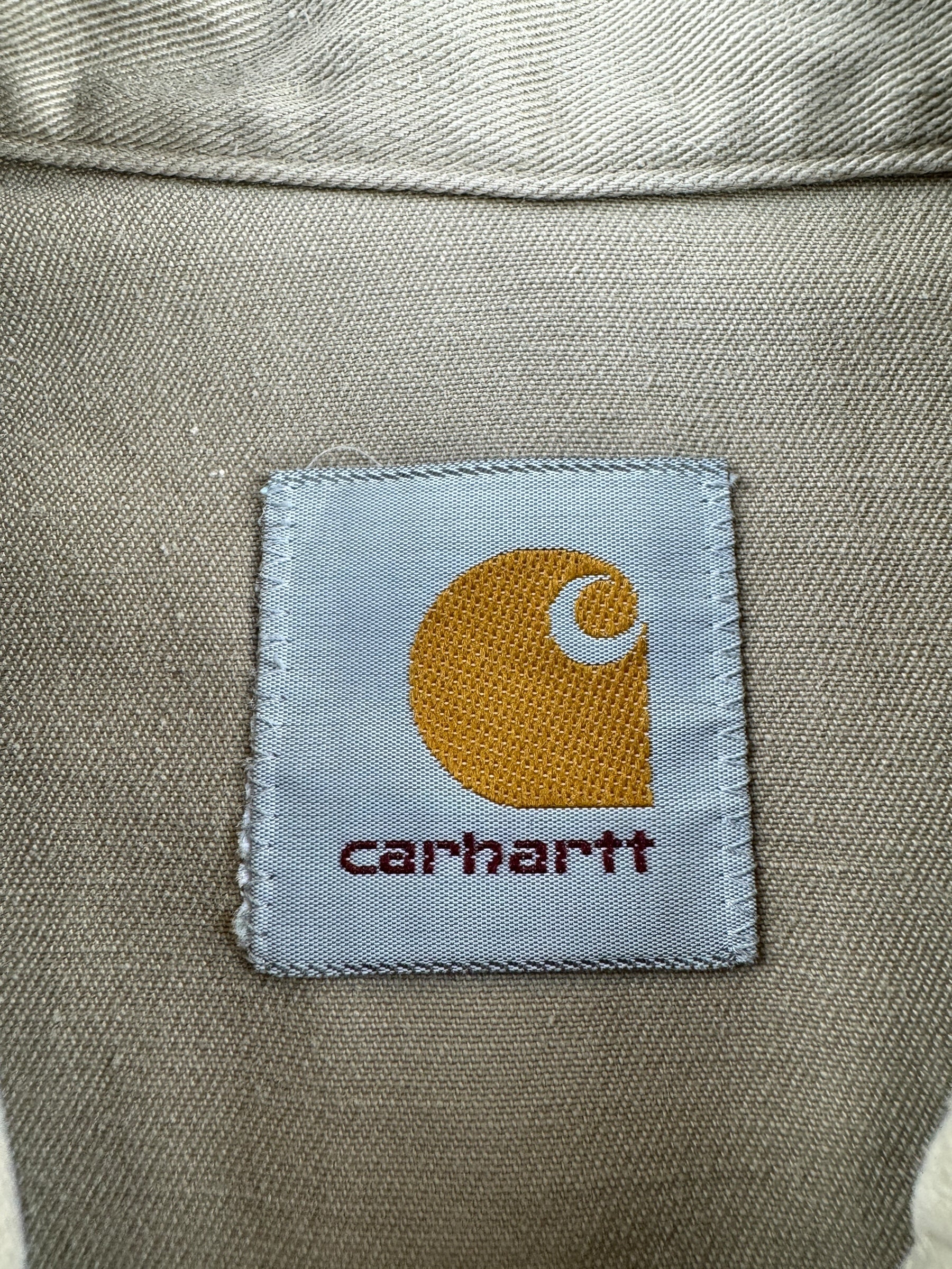 Label on Vintage Tan Carhartt Western Pearl Snap Shirt SZ L