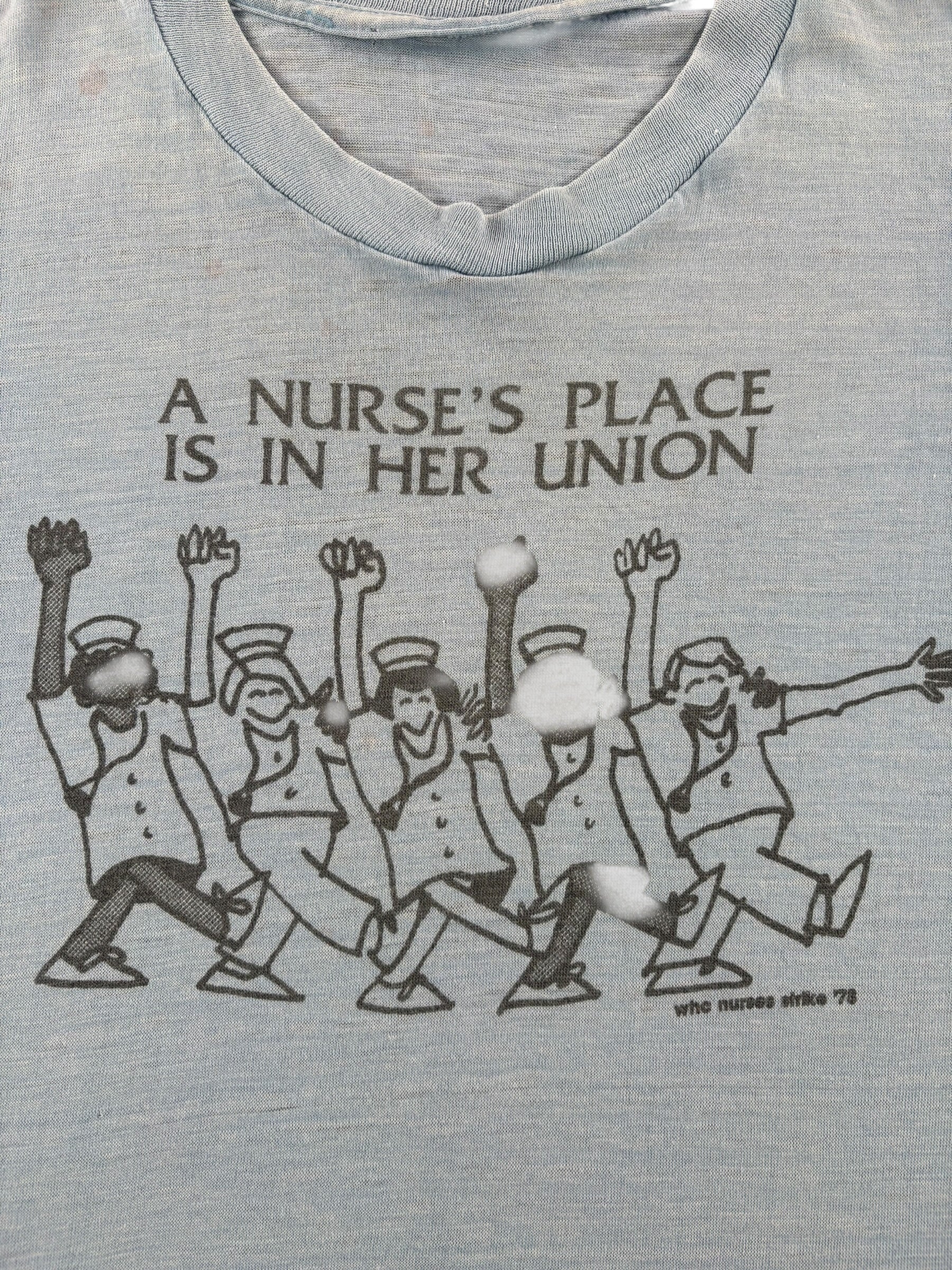 Graphic of Vintage A Nurse's Place Is In Her Union Tee SZ M