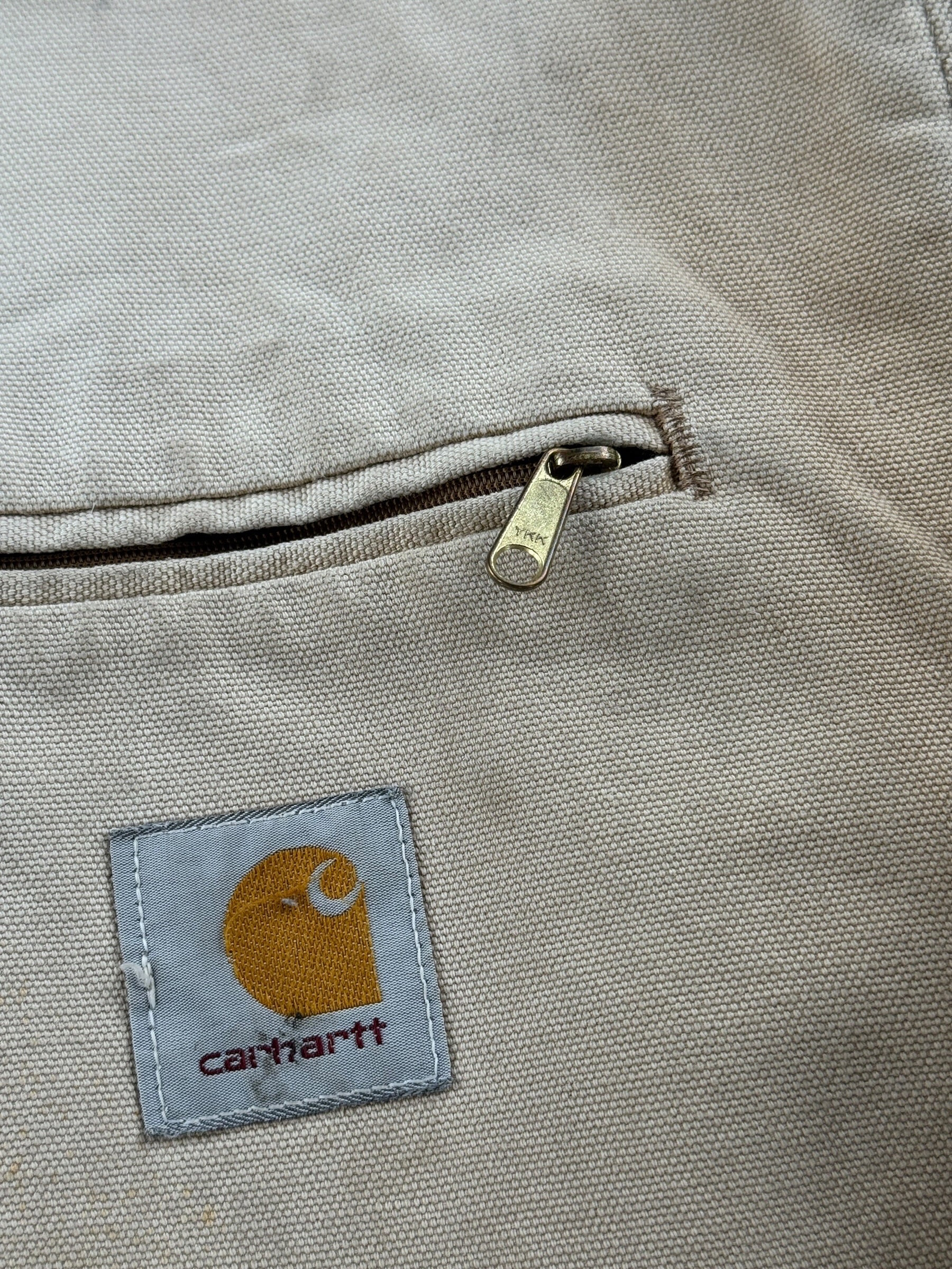 Pocket zipper and carhartt patch on Vintage 90’s Carhartt Faded Tan Detroit Jacket SZ XL