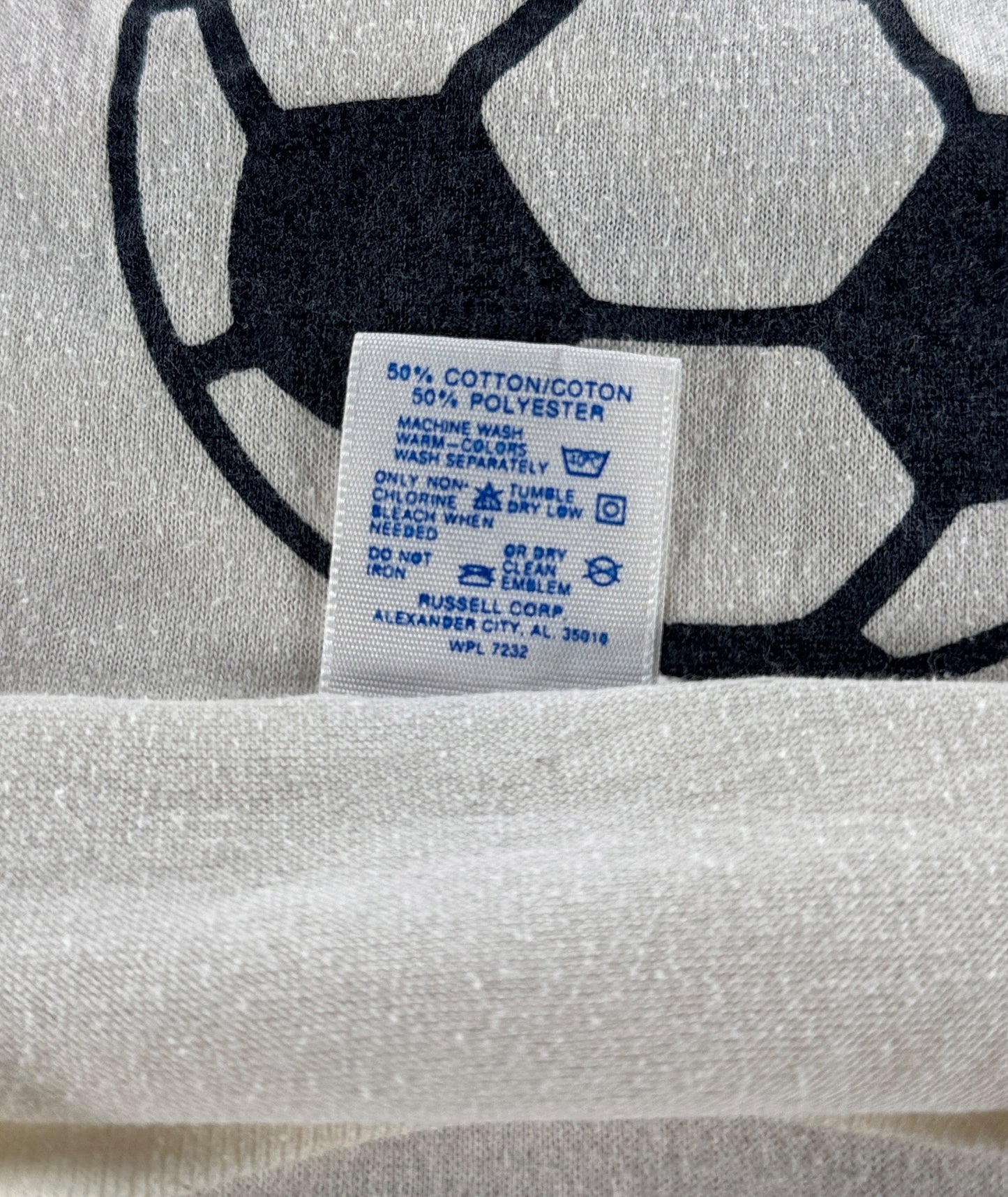 Back of tag on Vintage '90 USSR vs Seattle Storm Tee SZ L (Fits M)