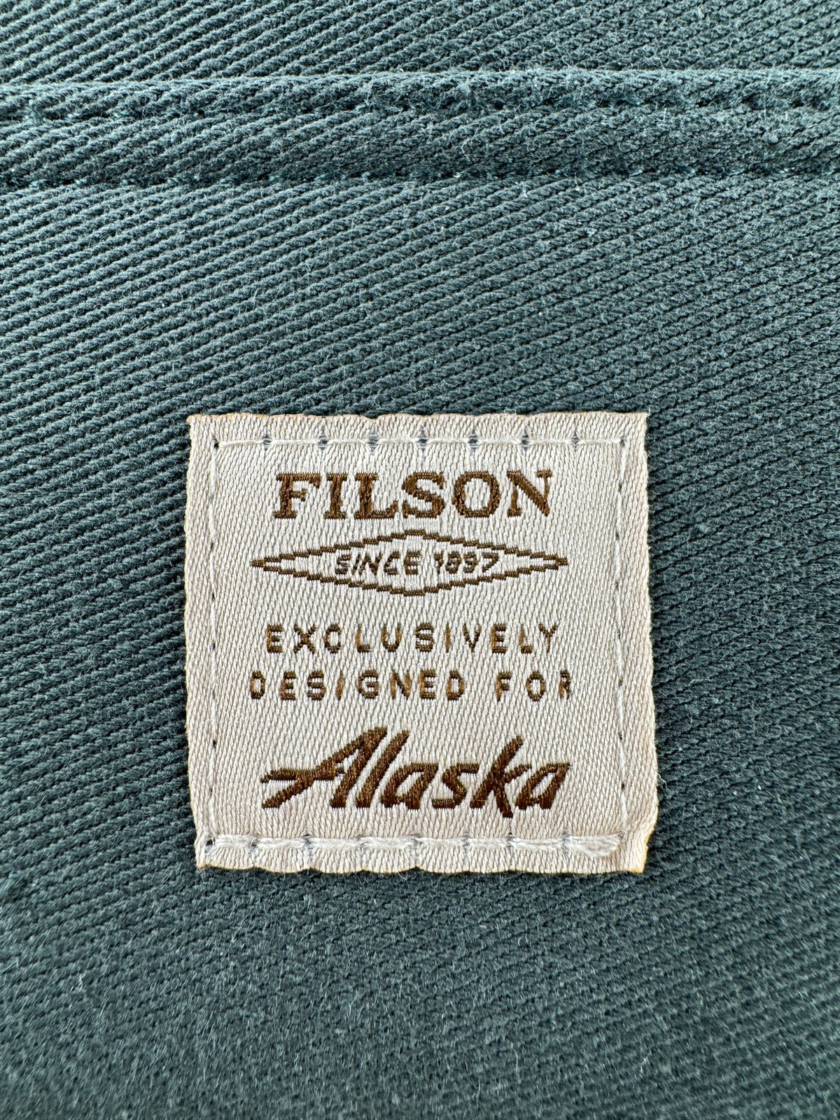 Filson X Alaska Patch on Filson X Alaska Airlines Mini Accessories Bag