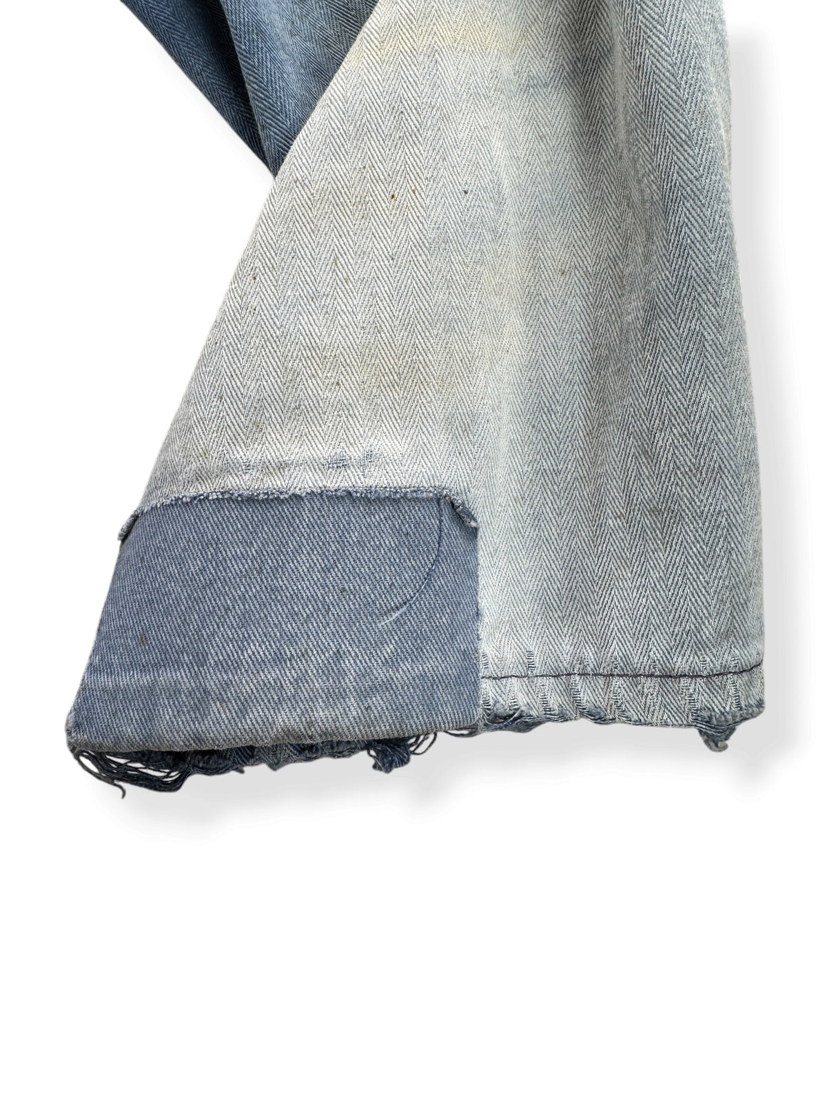 Repair on cuff of Vintage Distressed French Chore Coat SZ L