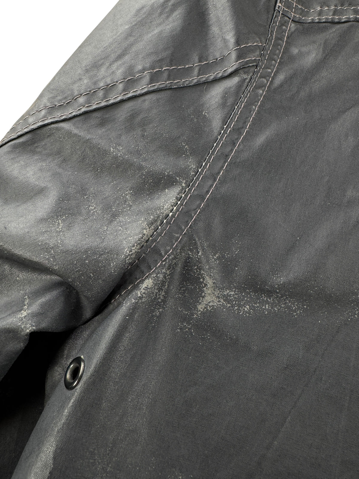 Ware on back of armpit of Filson Short Lined Cruiser SZ L