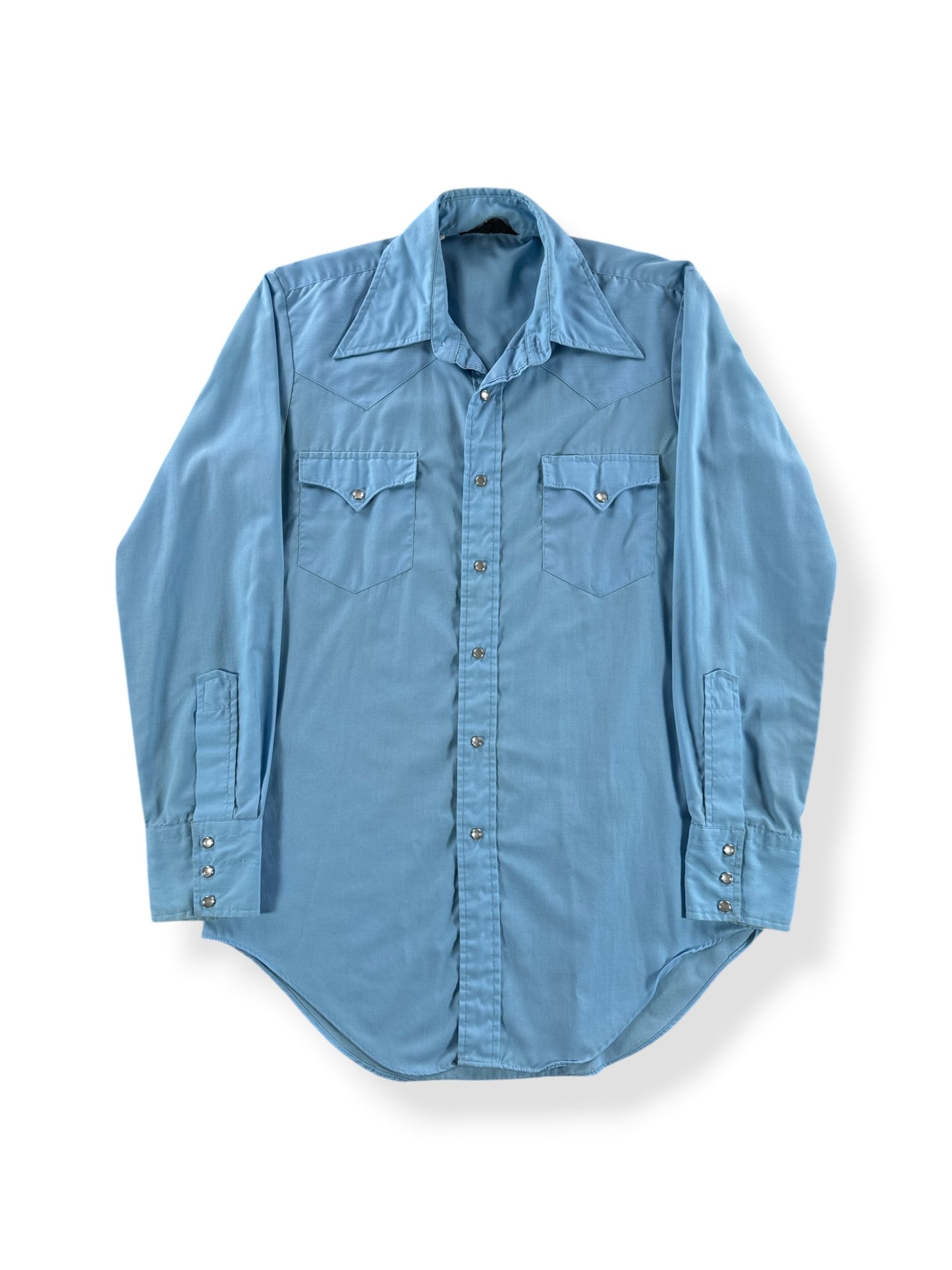 Front of Vintage Sears Cotton/Poly Light Blue Pearlsnap SZ S