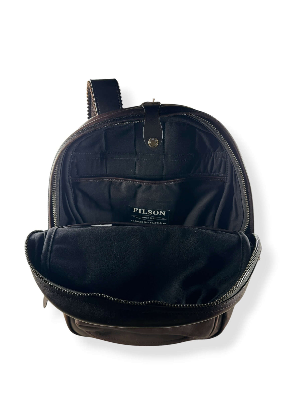 Open main pocket on Filson Weatherproof Sierra Brown Leather Journeyman Backpack