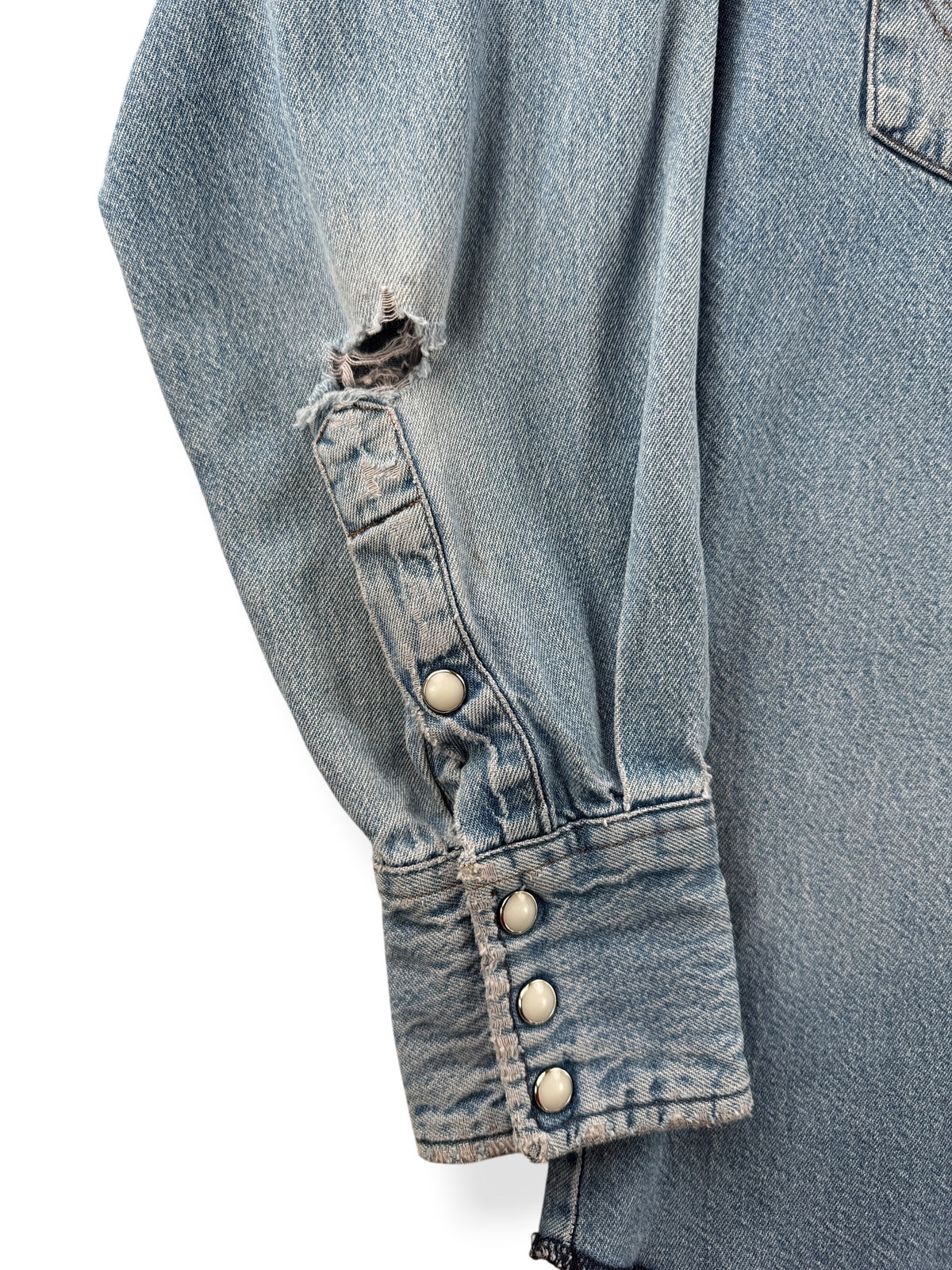 Ware on sleeve of Vintage Distressed Wrangler Pearlsnap SZ S