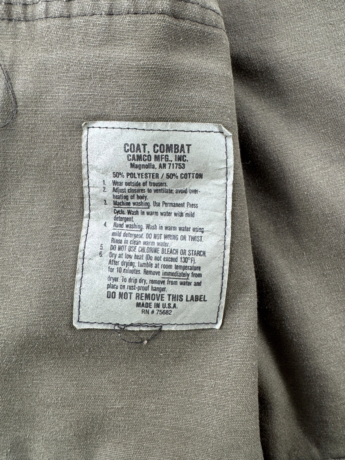 Info tag on Vintage Cabella's Camo Chore Coat SZ XXL
