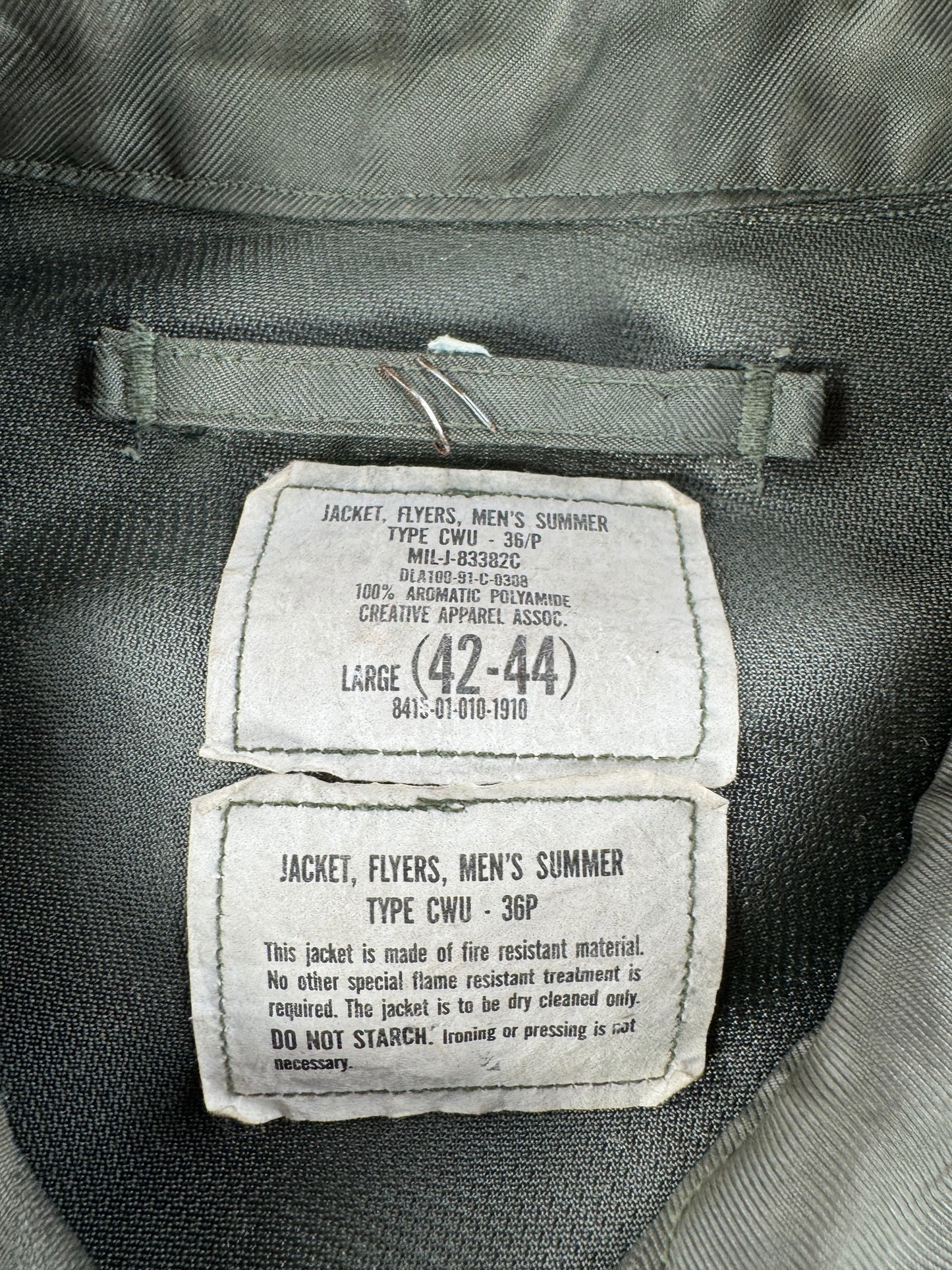 Tag on Vintage CWU Military Flight Jacket SZ L