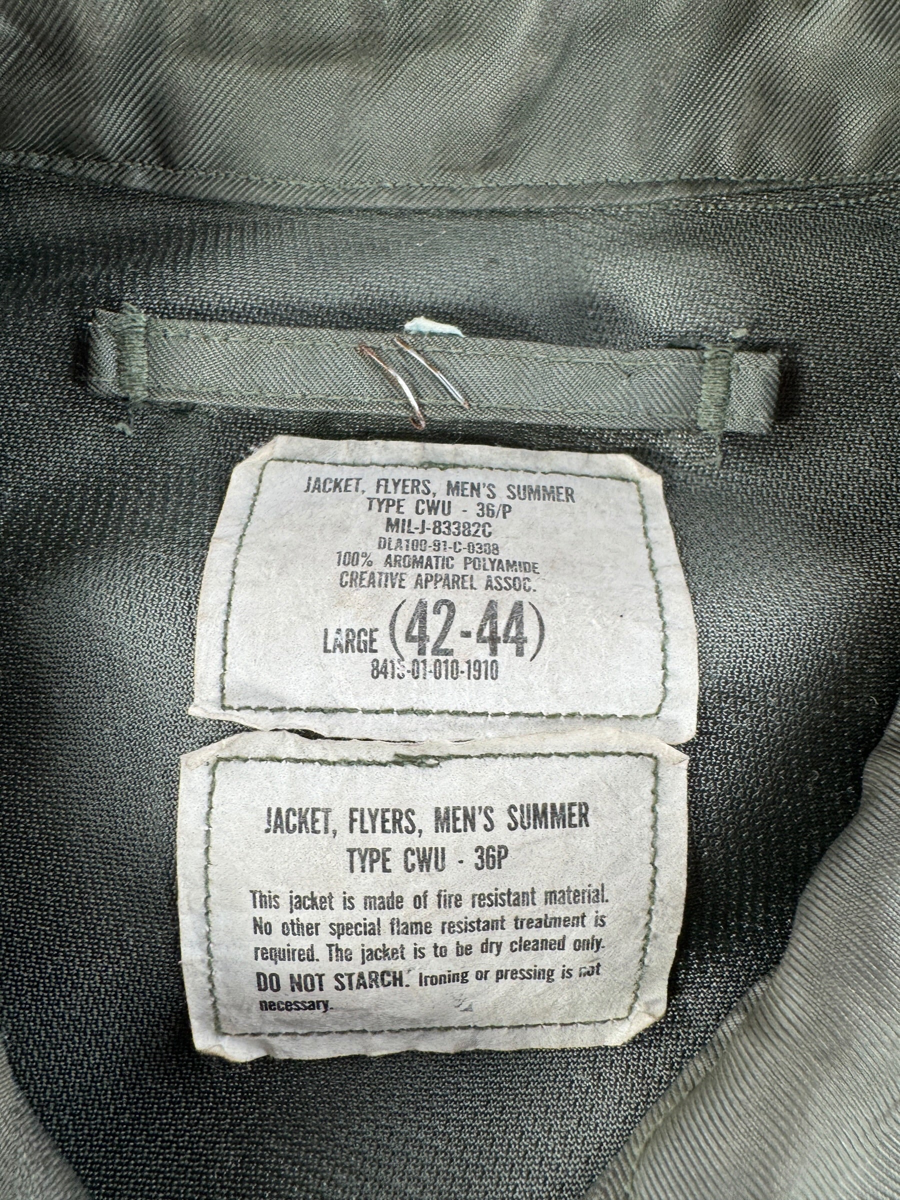 Tag on Vintage CWU Military Flight Jacket SZ L