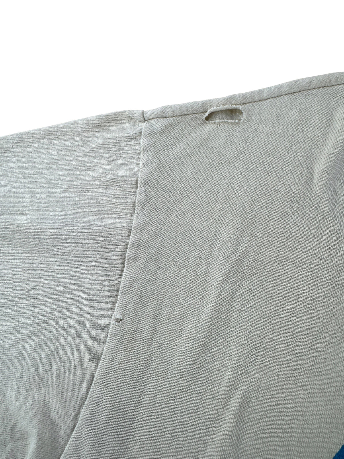 Hole on back shoulder of Vintage Distressed Myer's Rum Tee SZ L