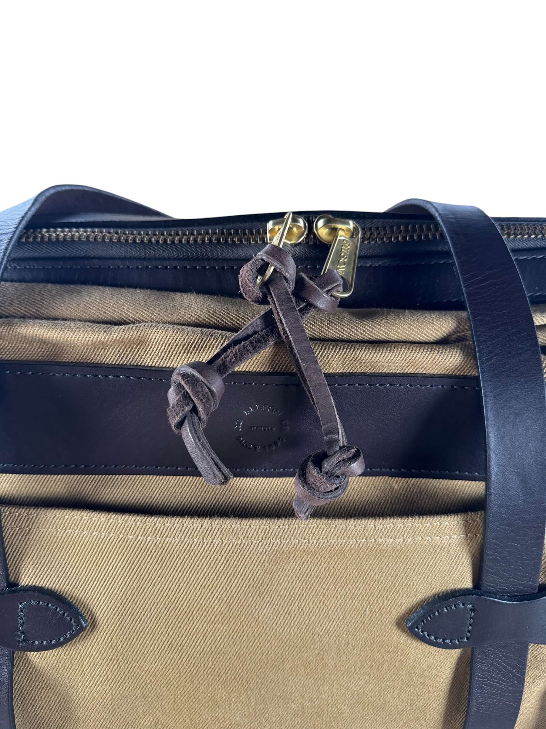 Zipper close-up of Filson Rugged Twill Pullman Bag NWOT