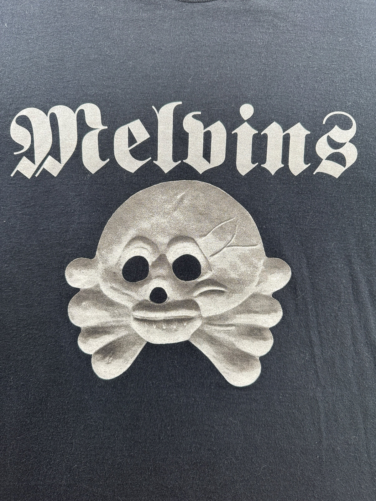 Front graphic on Vintage Early 90s Era Melvins Skull Glitter Print Tee SZ M