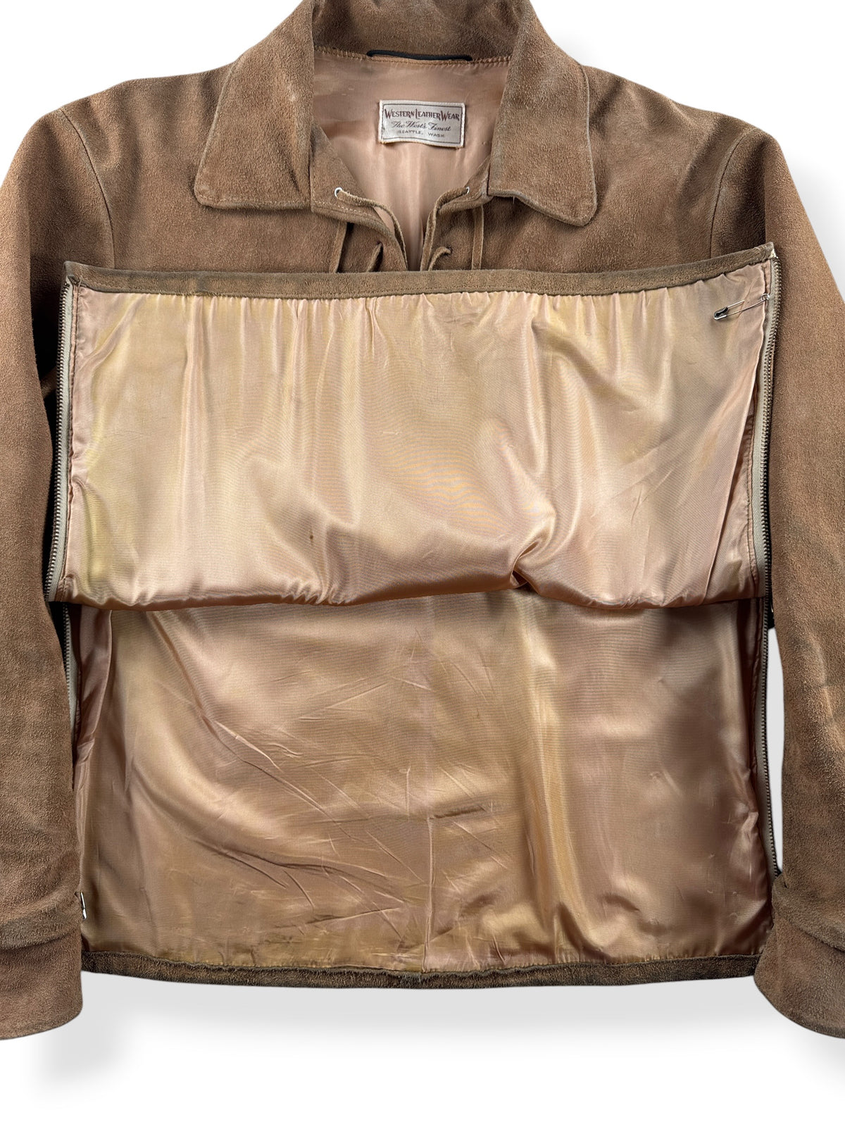 Unzipped side-zips and inner lining on Vintage Leather Lace Up Pullover SZ M