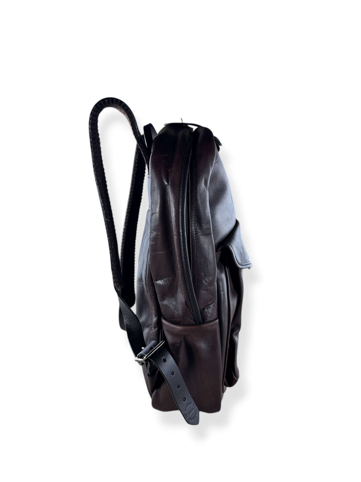 Side of Filson Weatherproof Sierra Brown Leather Journeyman Backpack