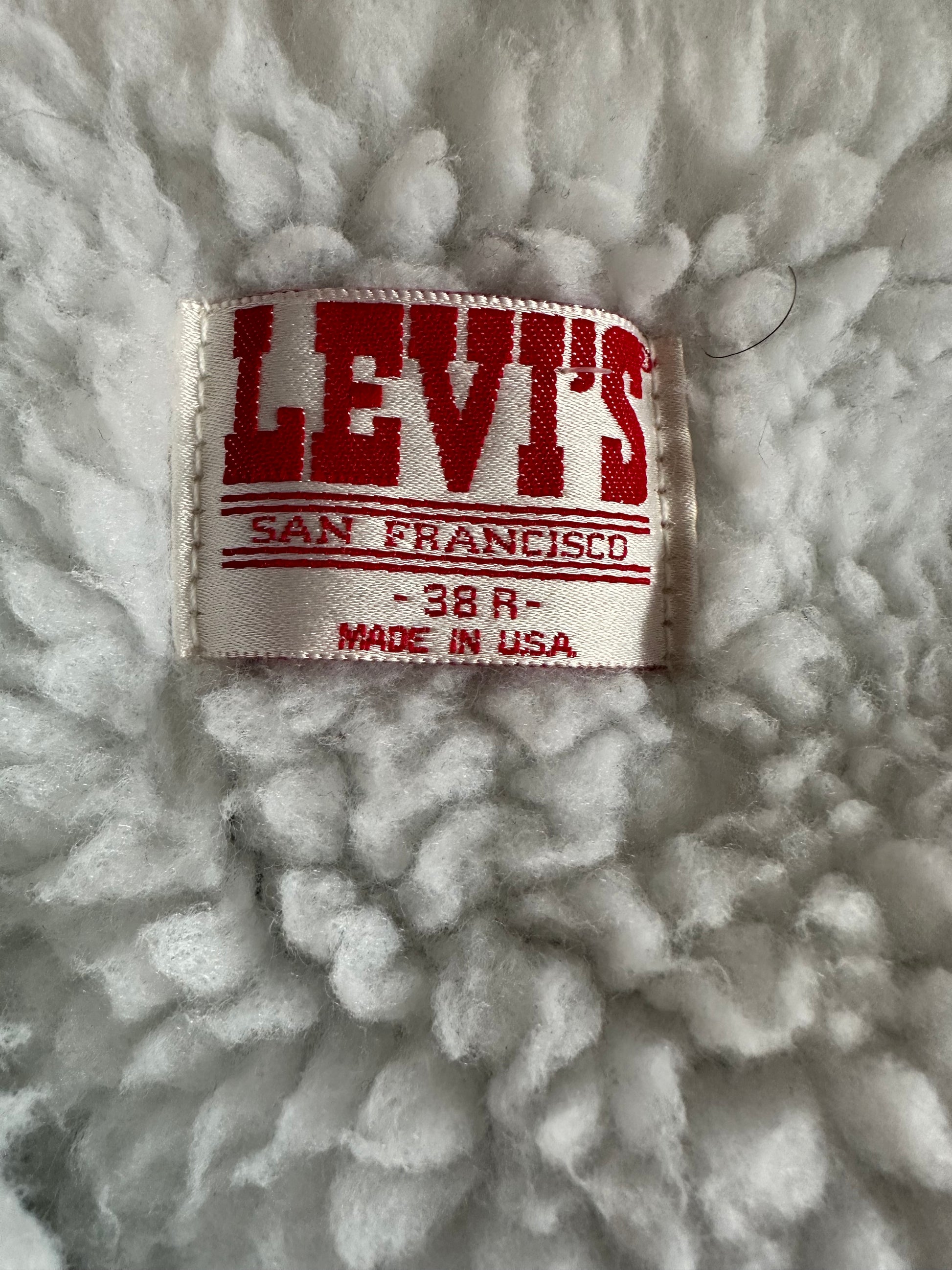 Size Tag View of Vintage Dark Wash Levis Sherpa Type III Denim Jacket SZ 38R | Vintage Denim Workwear Seattle | Barn Owl Seattle