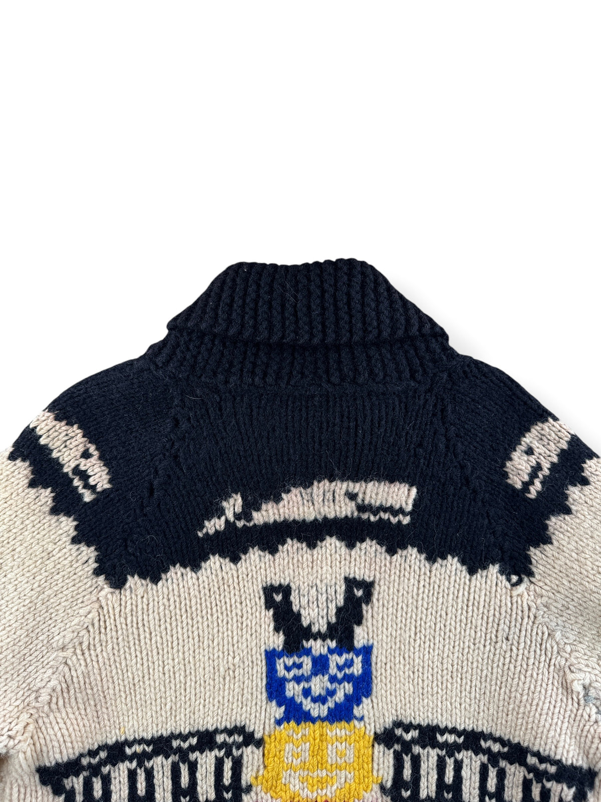Whale detail on back collar of Vintage Totem Thunderbird Cowichan Sweater SZ S