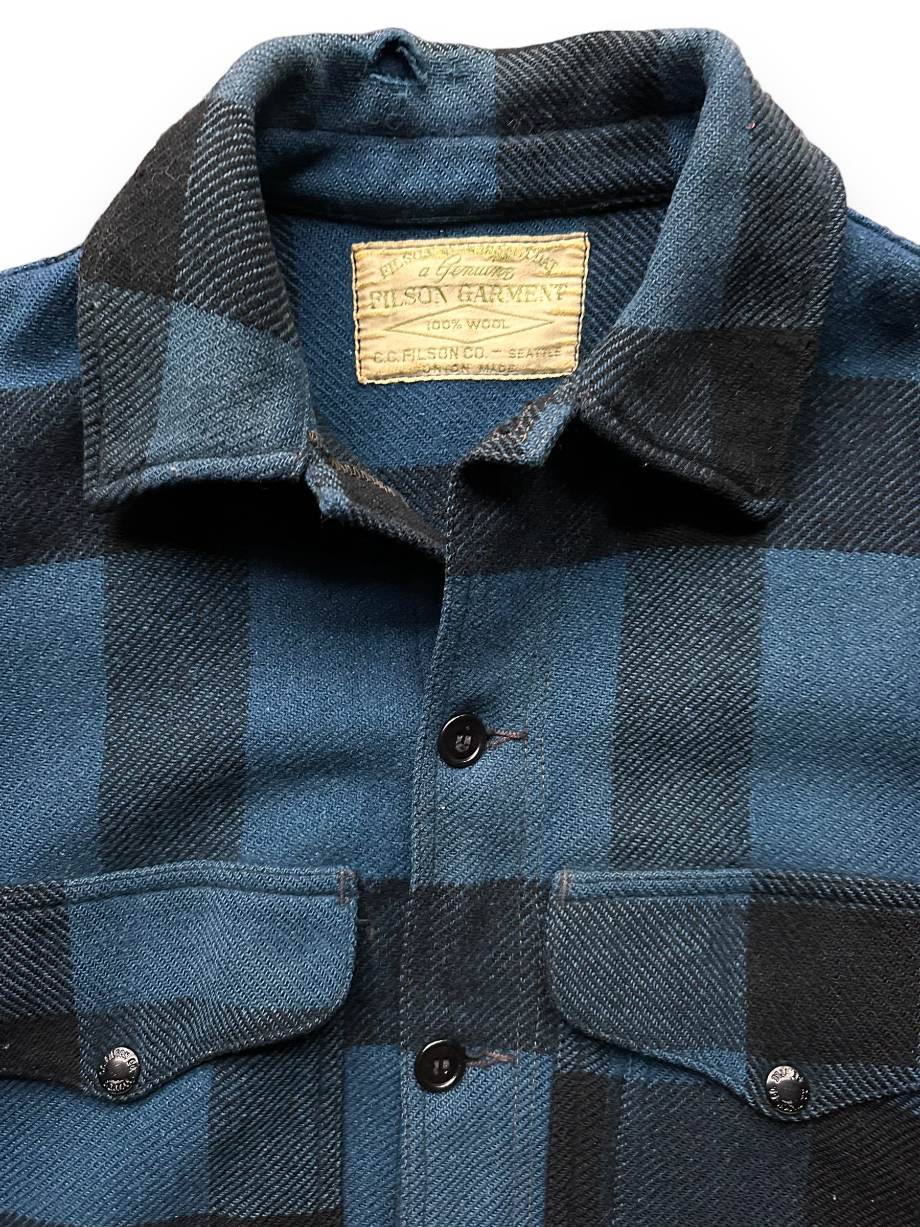 Tag View of Vintage Union Made Filson Cobalt Blue & Black All Use Coat SZ 46  |  Vintage Filson Workwear Seattle | Barn Owl Vintage Seattle