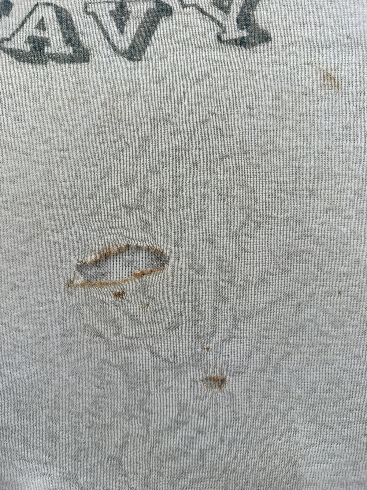 Hole on front of Vintage 1940s US Navy Waterprint Tee SZ M
