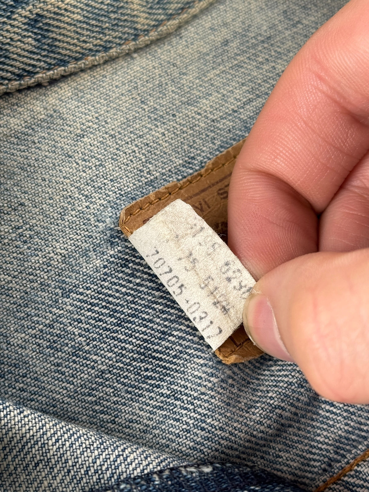 Back of tag on Vintage 70’s Orange Tab Levi’s Denim Jacket SZ S