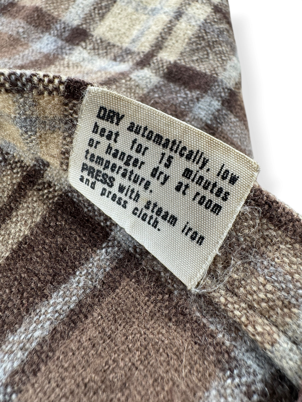 Back of care tag on Vintage Pendleton Brown Board Shirt SZ L