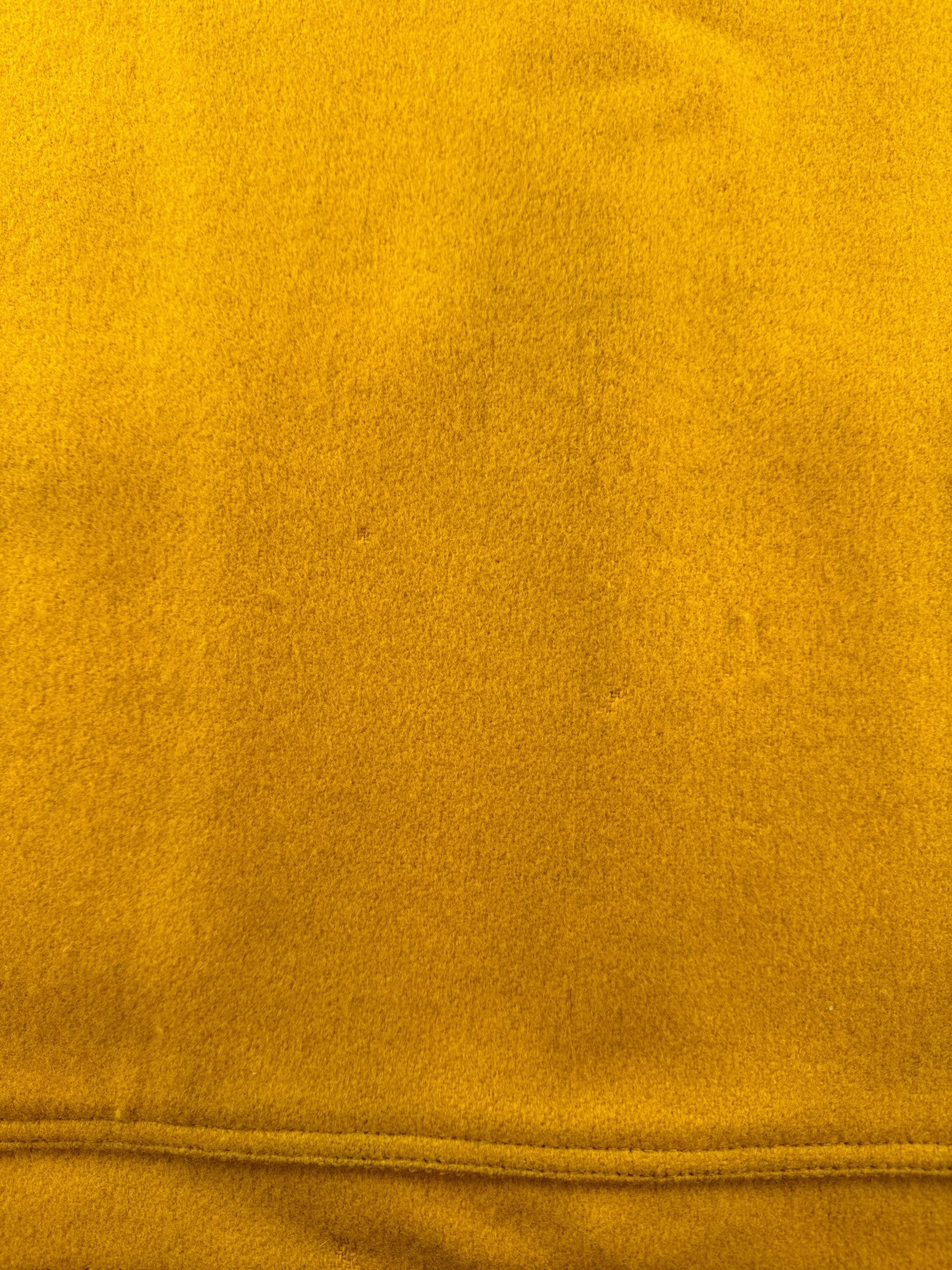 Small Moth Nibbles on Rear of Filson Gold Cruiser 