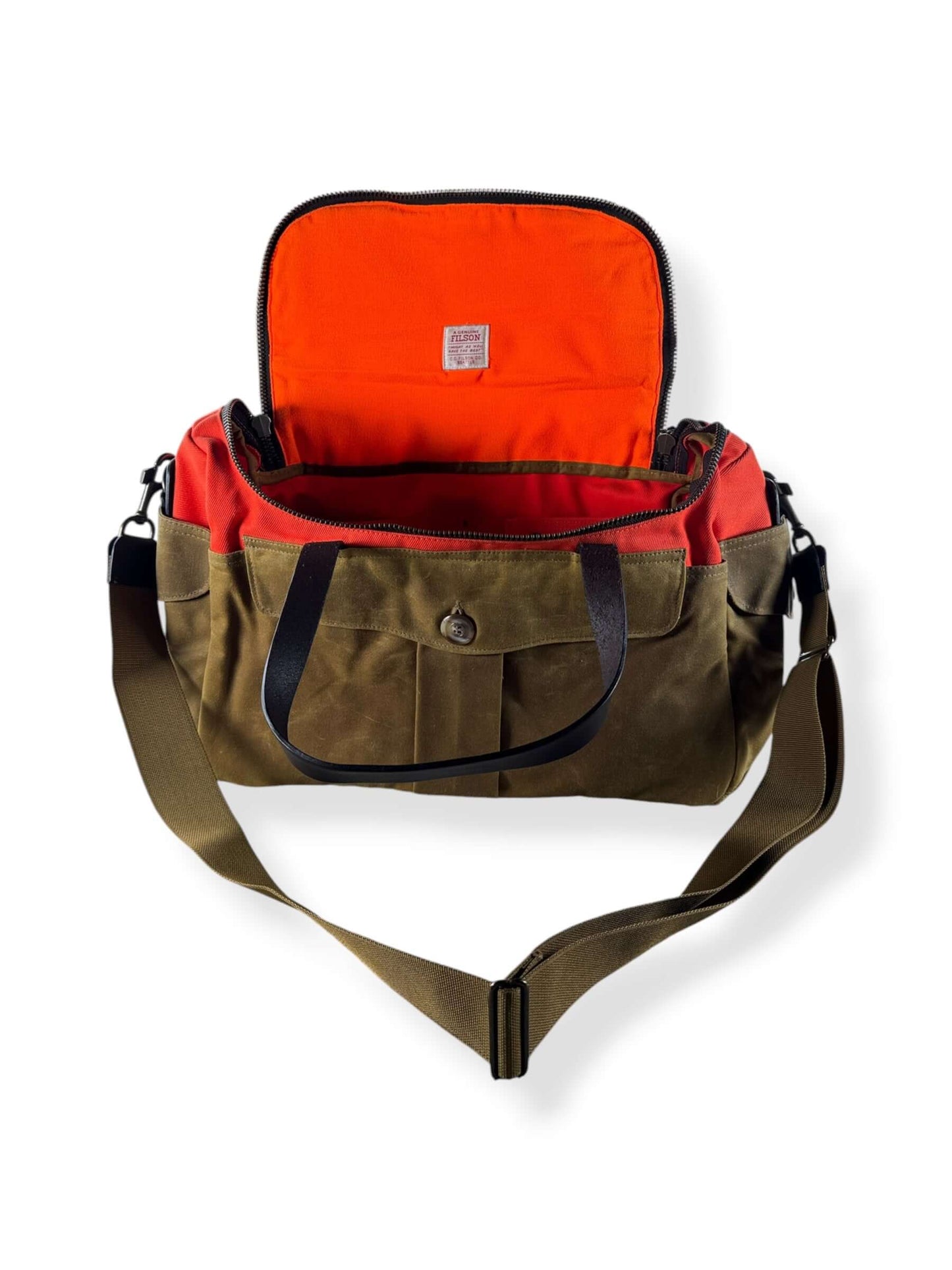 Open front flap of Filson Heritage Sportsman Bag Orange Dark Tan NWOT