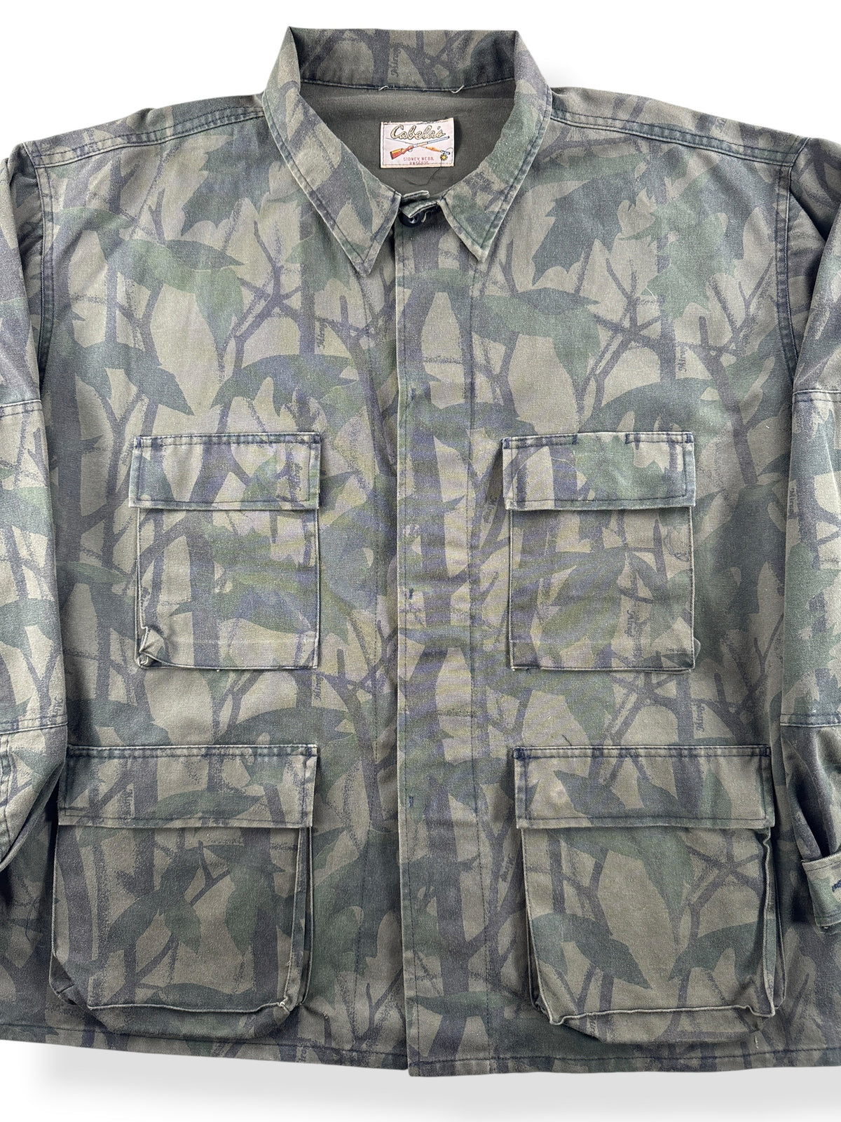 Close-up of Vintage Cabella's Camo Chore Coat SZ XXL