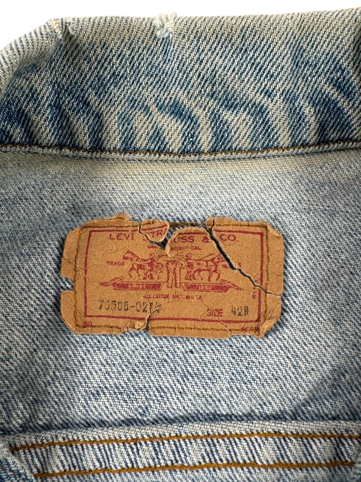 Label on Vintage 90s MIUSA Levi's Trucker Jacket SZ 42