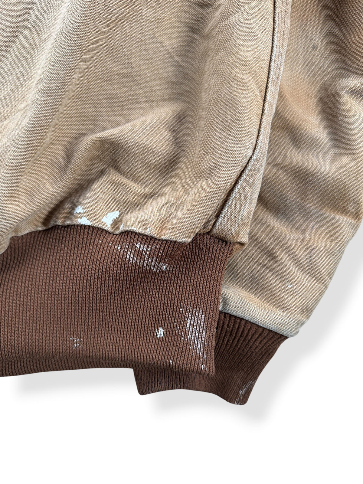 Paint stain on back of Carhartt Tan Hooded Jacket SZ L