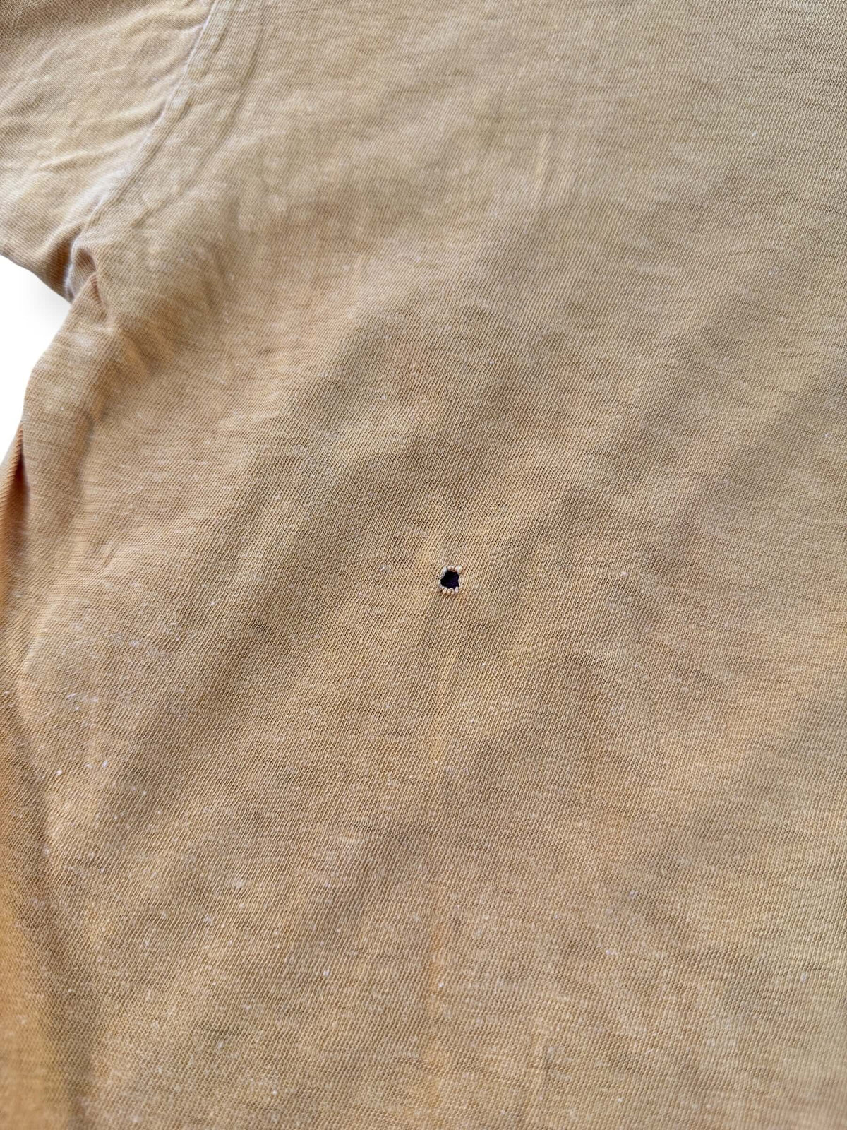 Small hole on back of reverse side of Vintage Champion Blue Bar CMA Reversible Tee SZ L