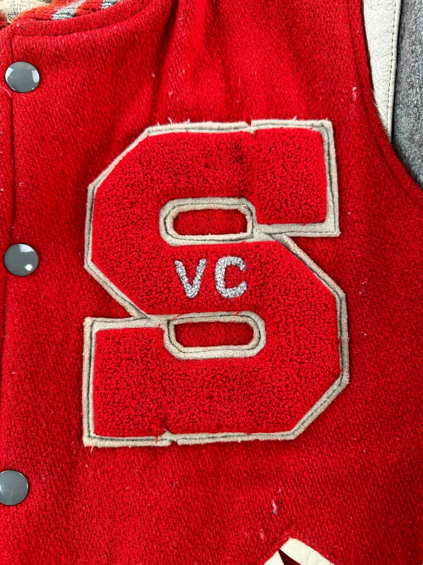 Front Patch of Vintage Spartans Varsity Jacket SZ L